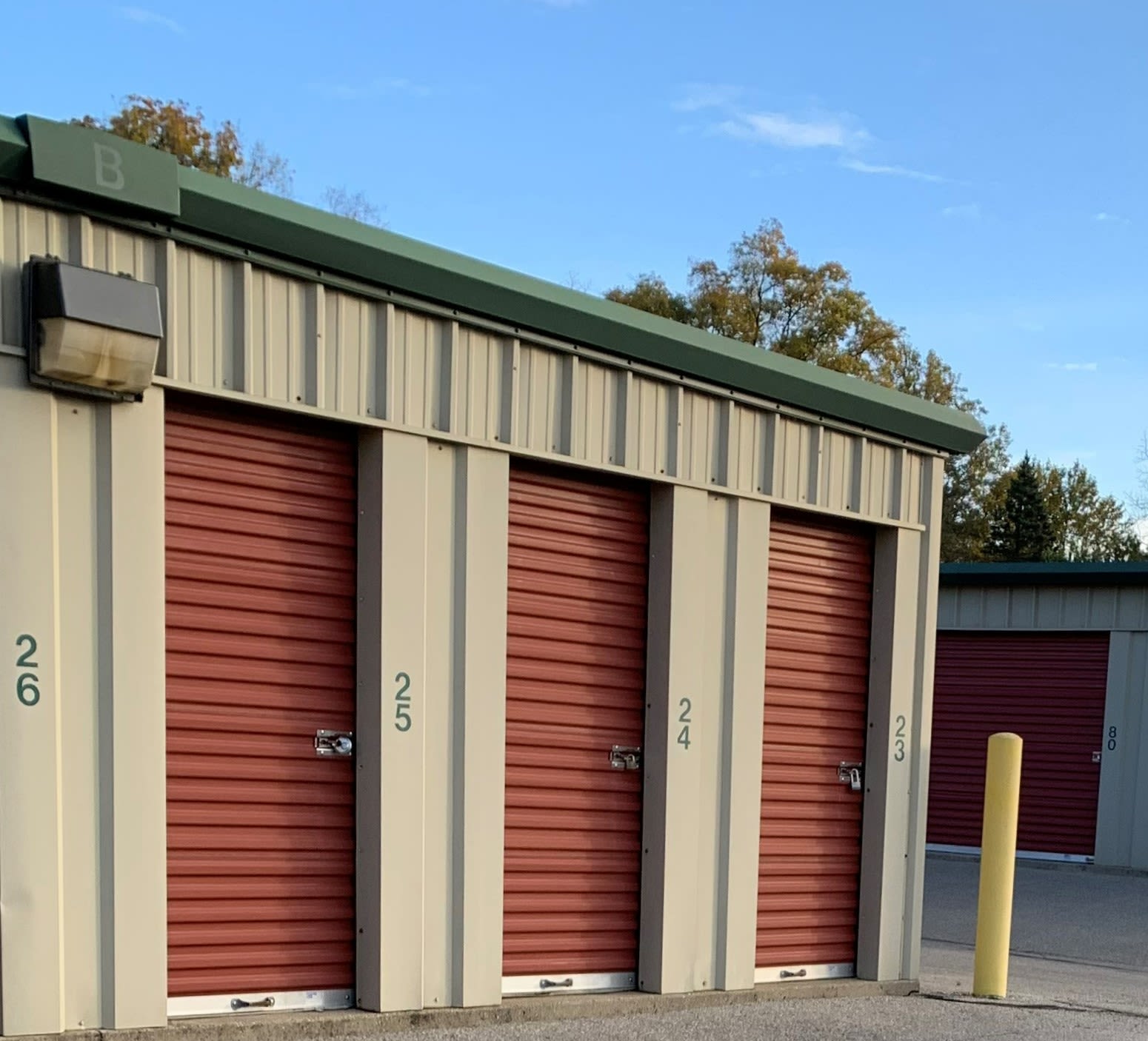 Storage units with blue doors and locks at KO Storage in Tipp City, Ohio