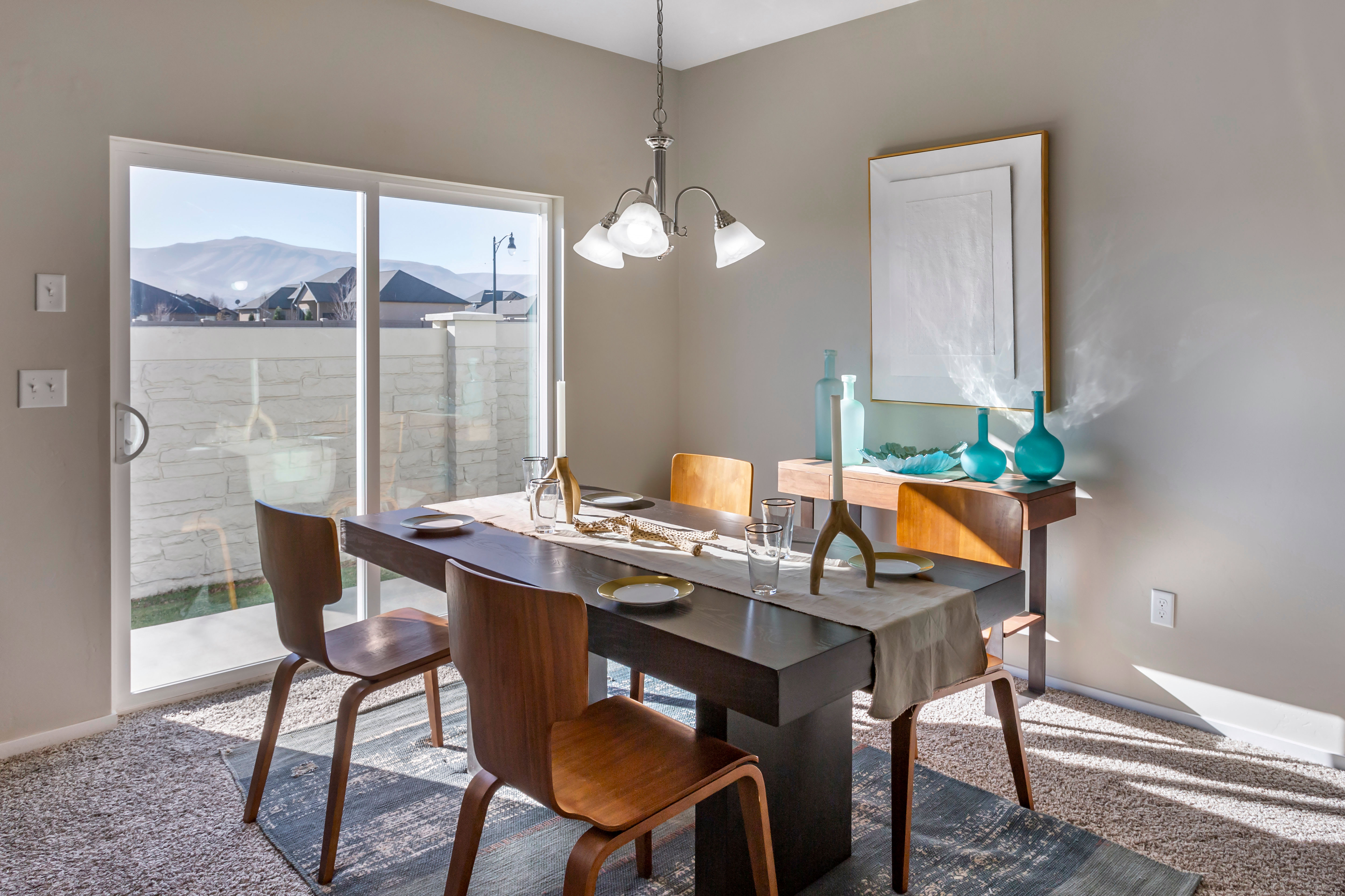 Minimalist living room with comfortable leather sofa at Olympus at the Canyons in Herriman, Utah