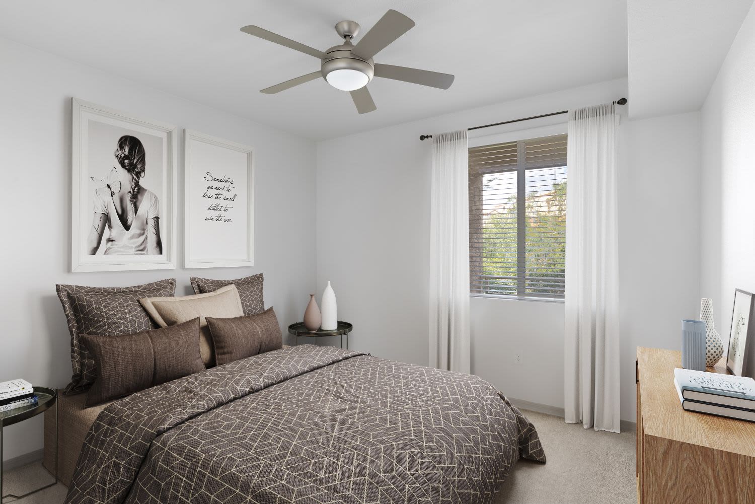 Well decorated bedroom at Ocio Plaza Del Rio in Peoria, Arizona