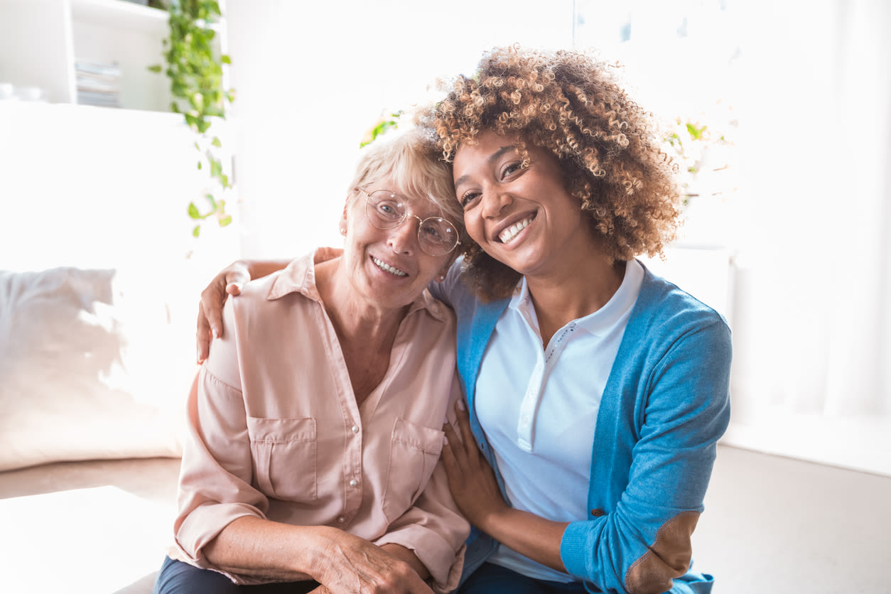 Two women hugging at Ebenezer Senior Living community