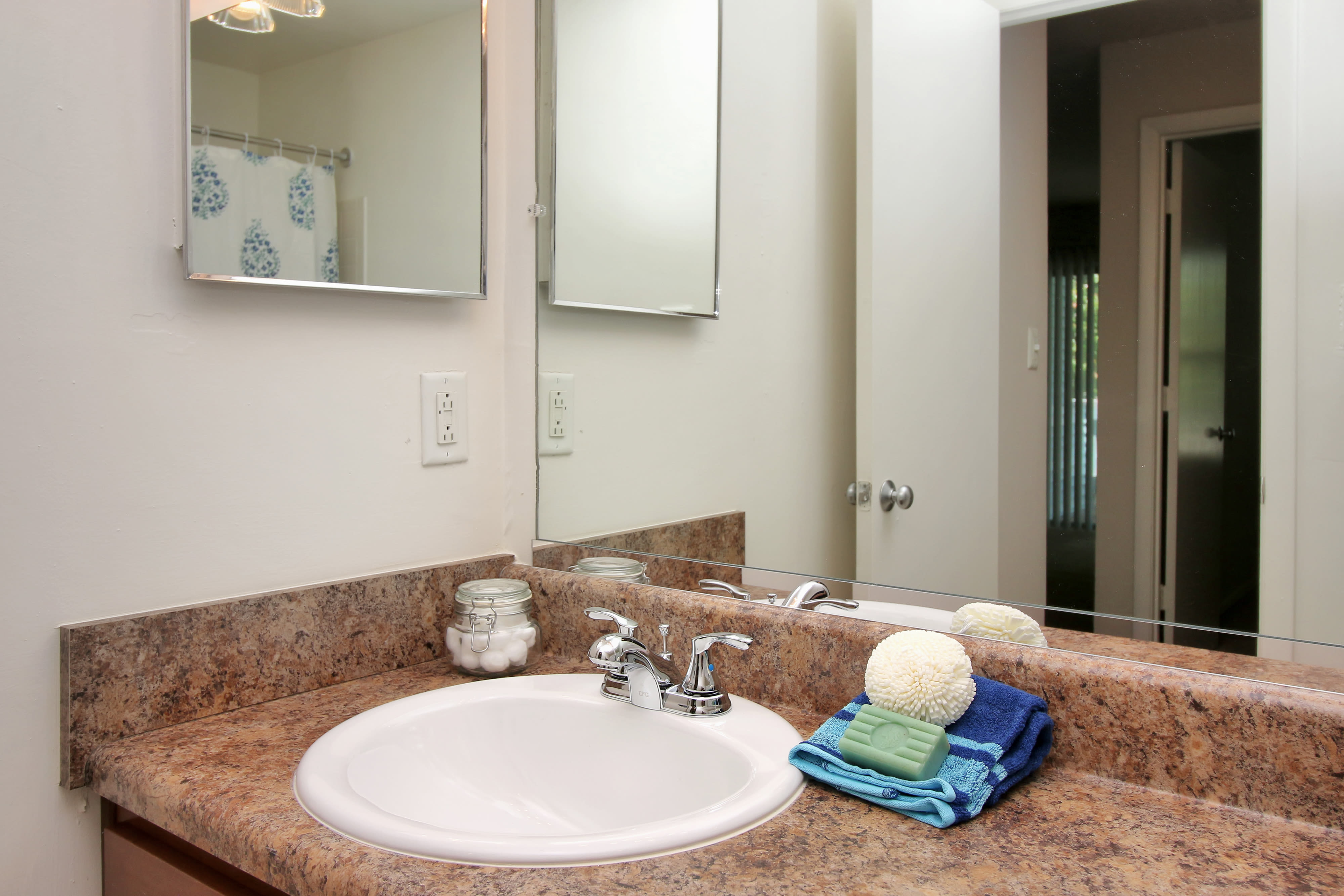 Bathroom sink at Runaway Bay Apartments in Virginia Beach, Virginia