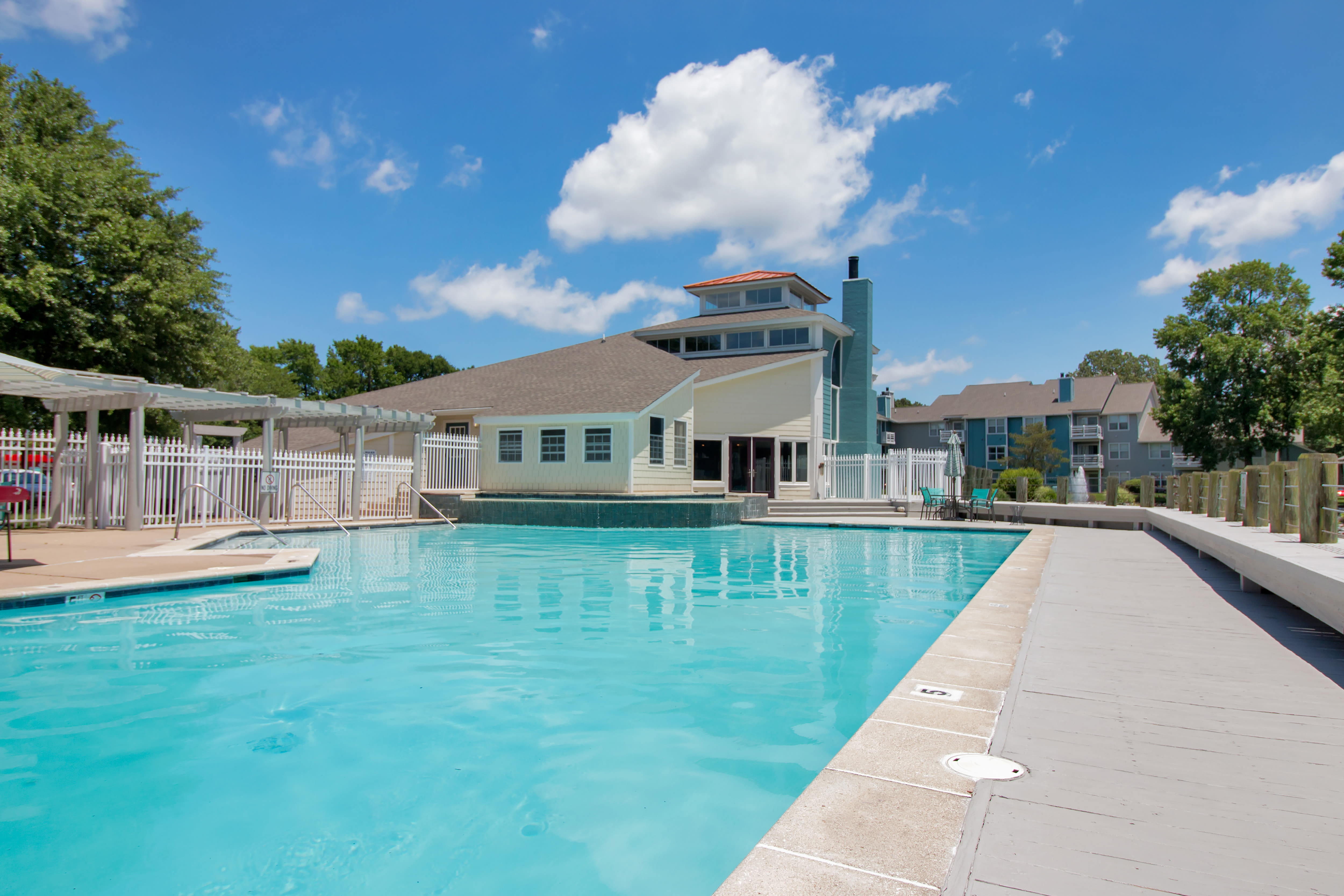Clubhouse with amenities poolside at Runaway Bay Apartments in Virginia Beach, Virginia
