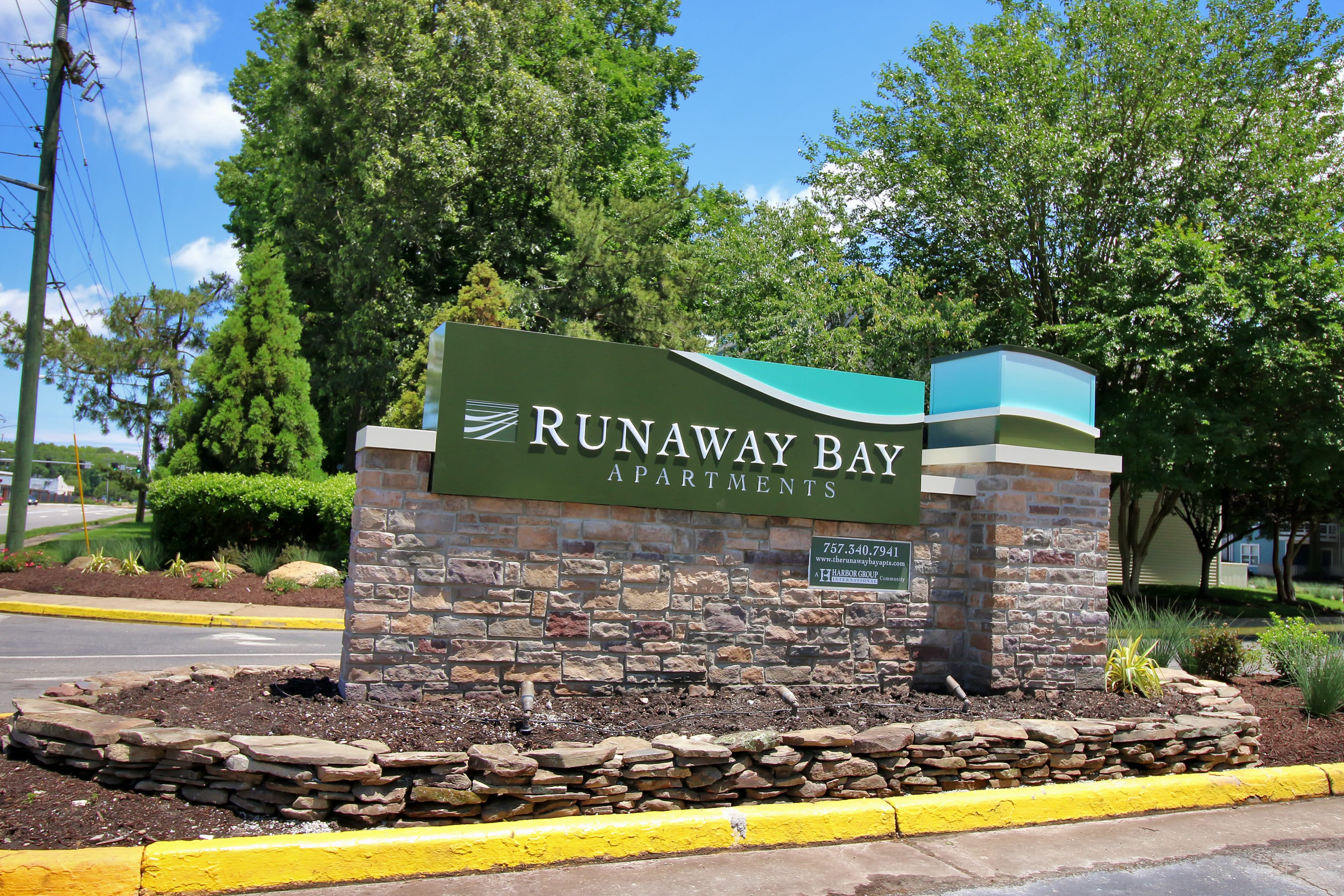 Entrance sign at Runaway Bay Apartments in Virginia Beach, Virginia