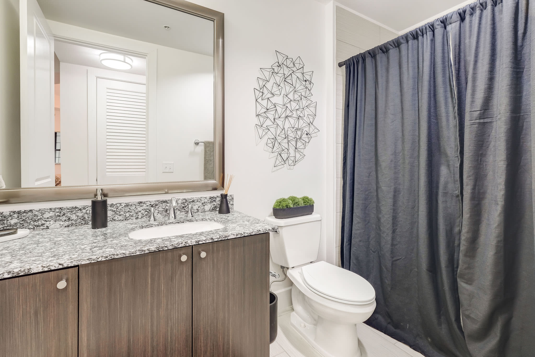 An updated bathroom at Cantabria at Turtle Creek in Dallas, Texas