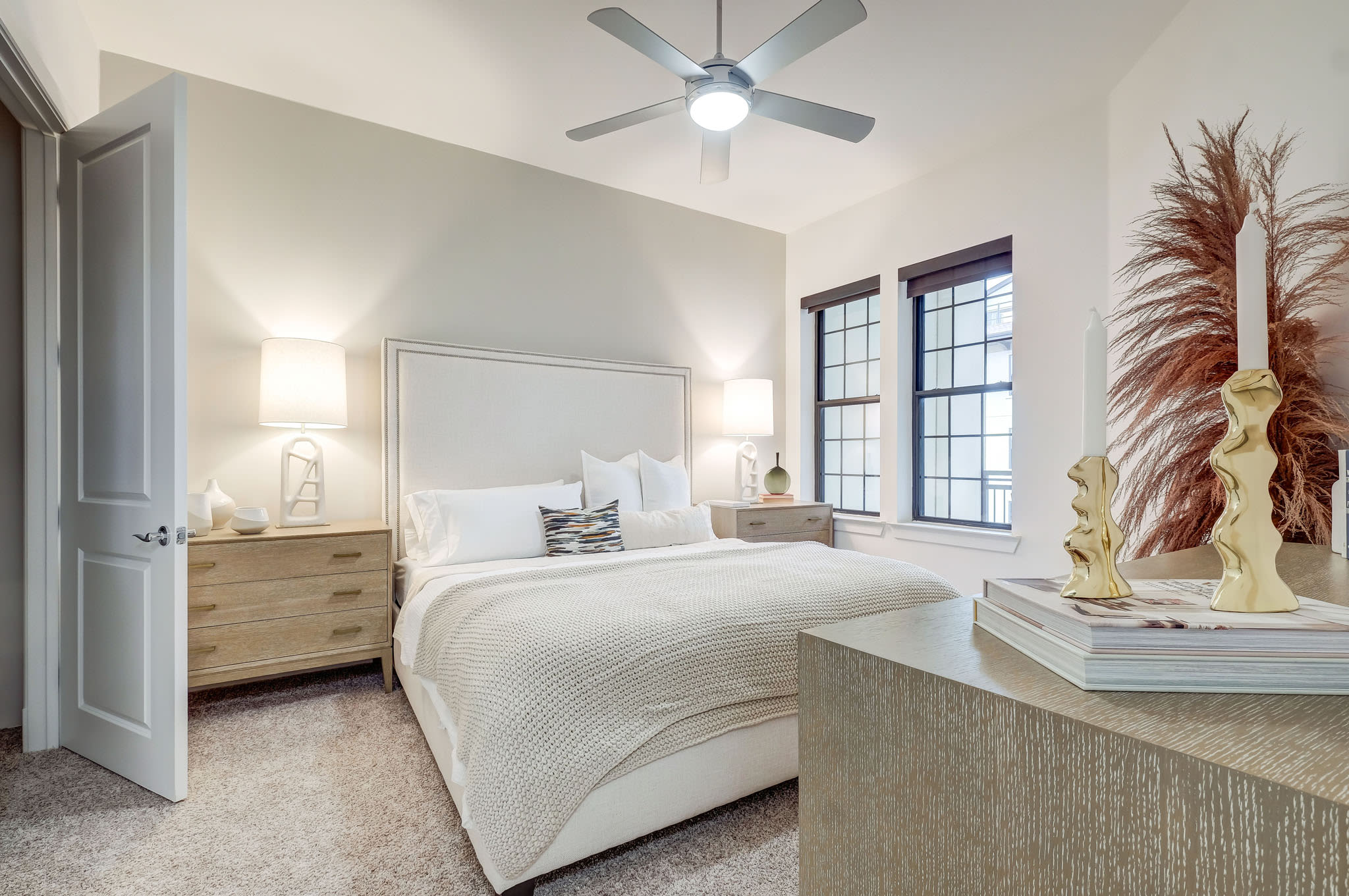 Large master bedroom with fan at Cantabria at Turtle Creek in Dallas, Texas