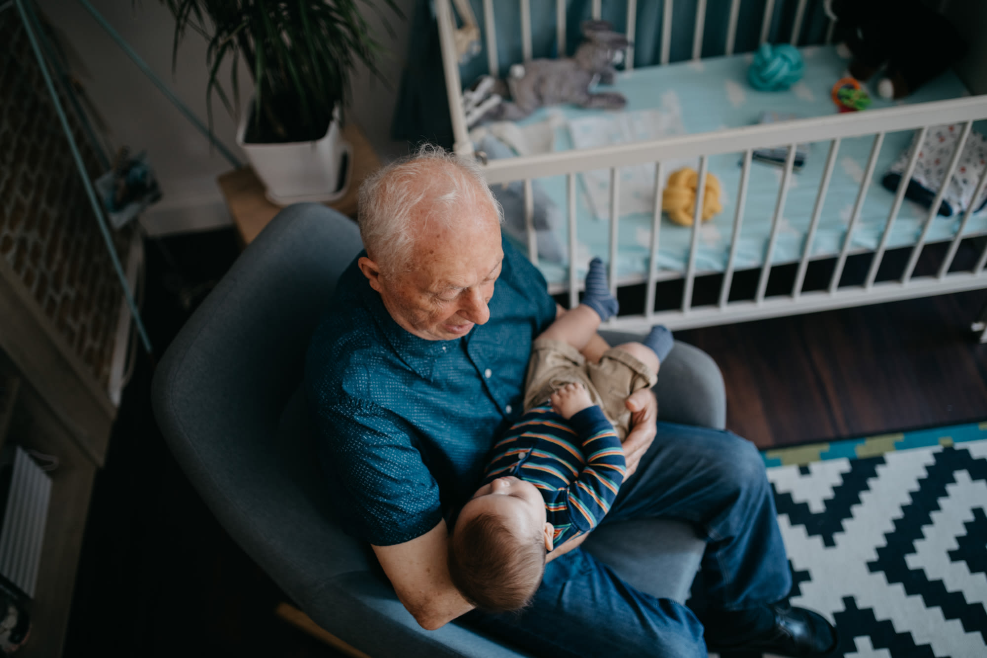 Resident holding their grandchild at Geneva Lake Manor in Lake Geneva, Wisconsin