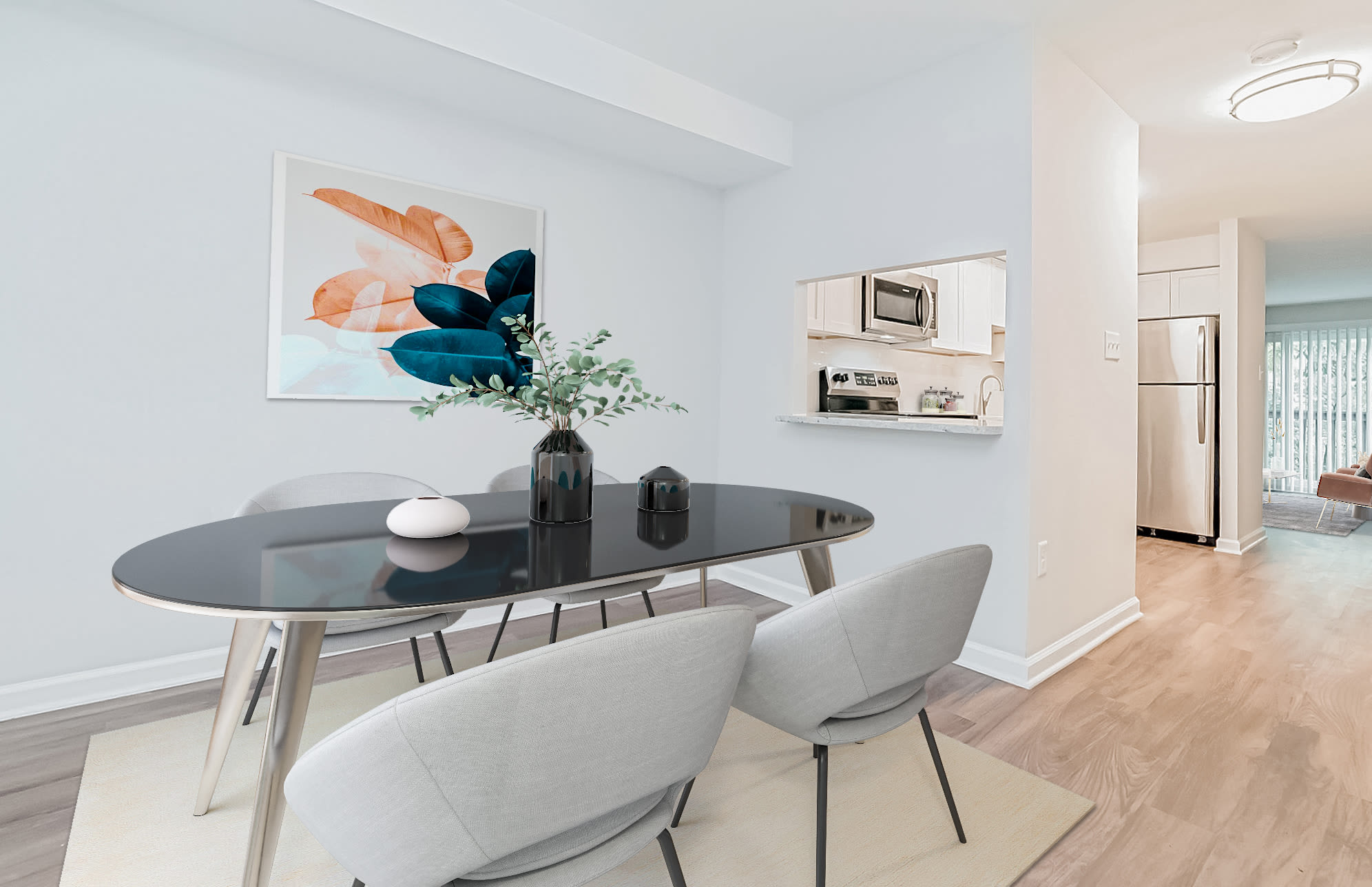 Dining room with view into kitchen at Beacon Pointe Apartments & Townhomes in Sparrows Point, Maryland