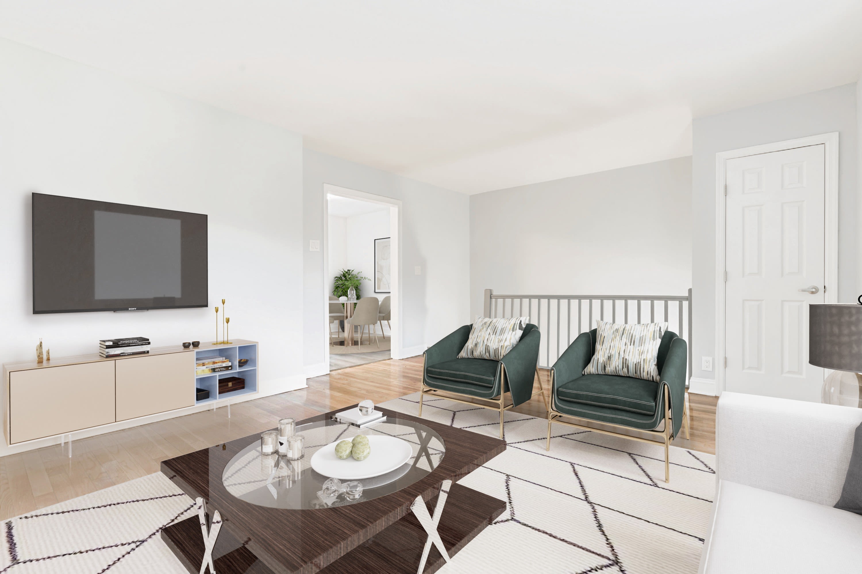 Living room with hardwood floors at Eagle Rock Apartments at Huntington Station in Huntington Station, New York