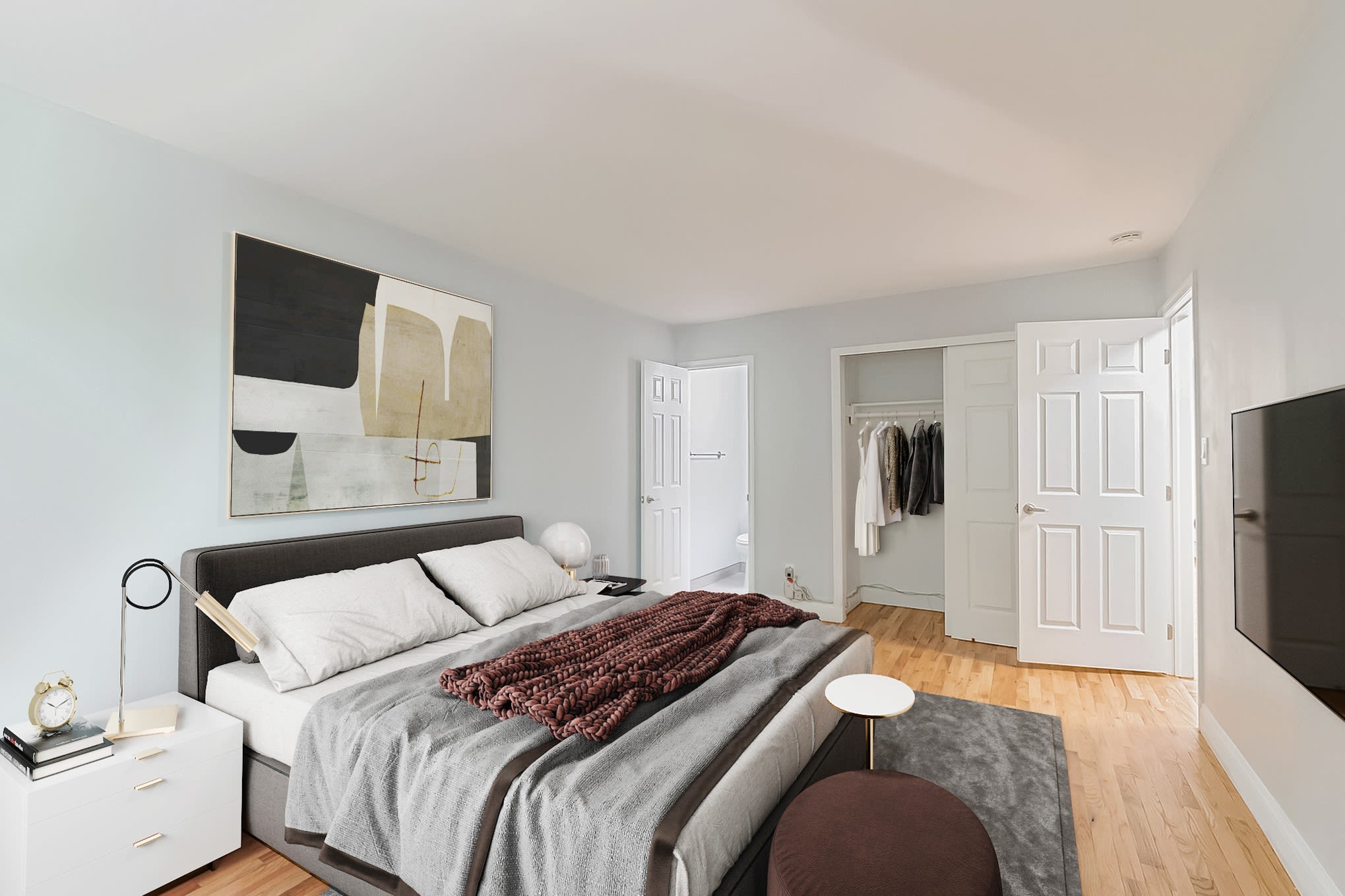 Hardwood floors in master bedroom at Eagle Rock Apartments at Nesconset in Nesconset, New York