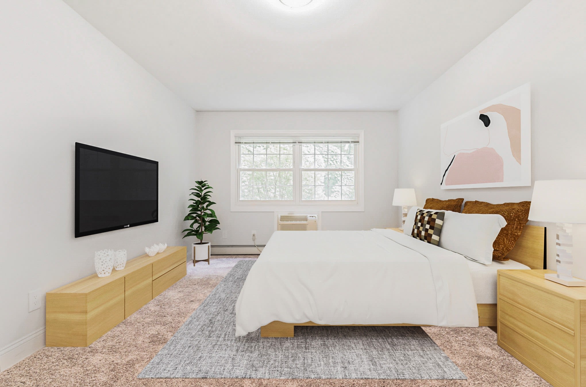 Spare bedroom at Eagle Rock Apartments at Woodbury in Woodbury, New York