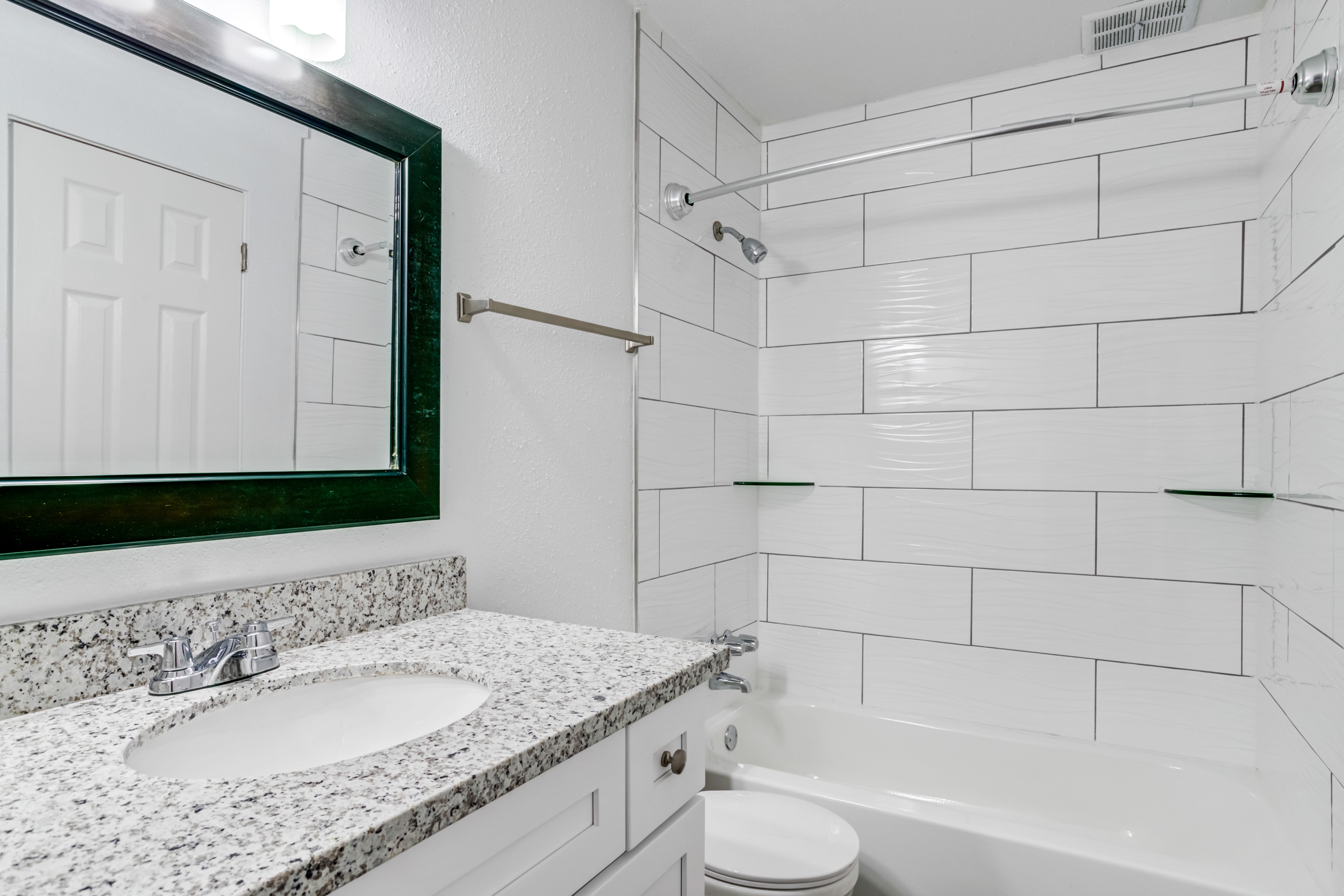 Bathroom with tile at Regents Walk in Houston, Texas