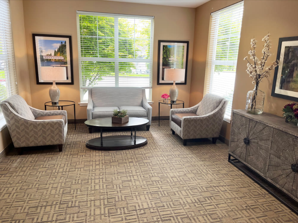 Naturally lit living rooms at Heron Pointe Senior Living in Monmouth, Oregon