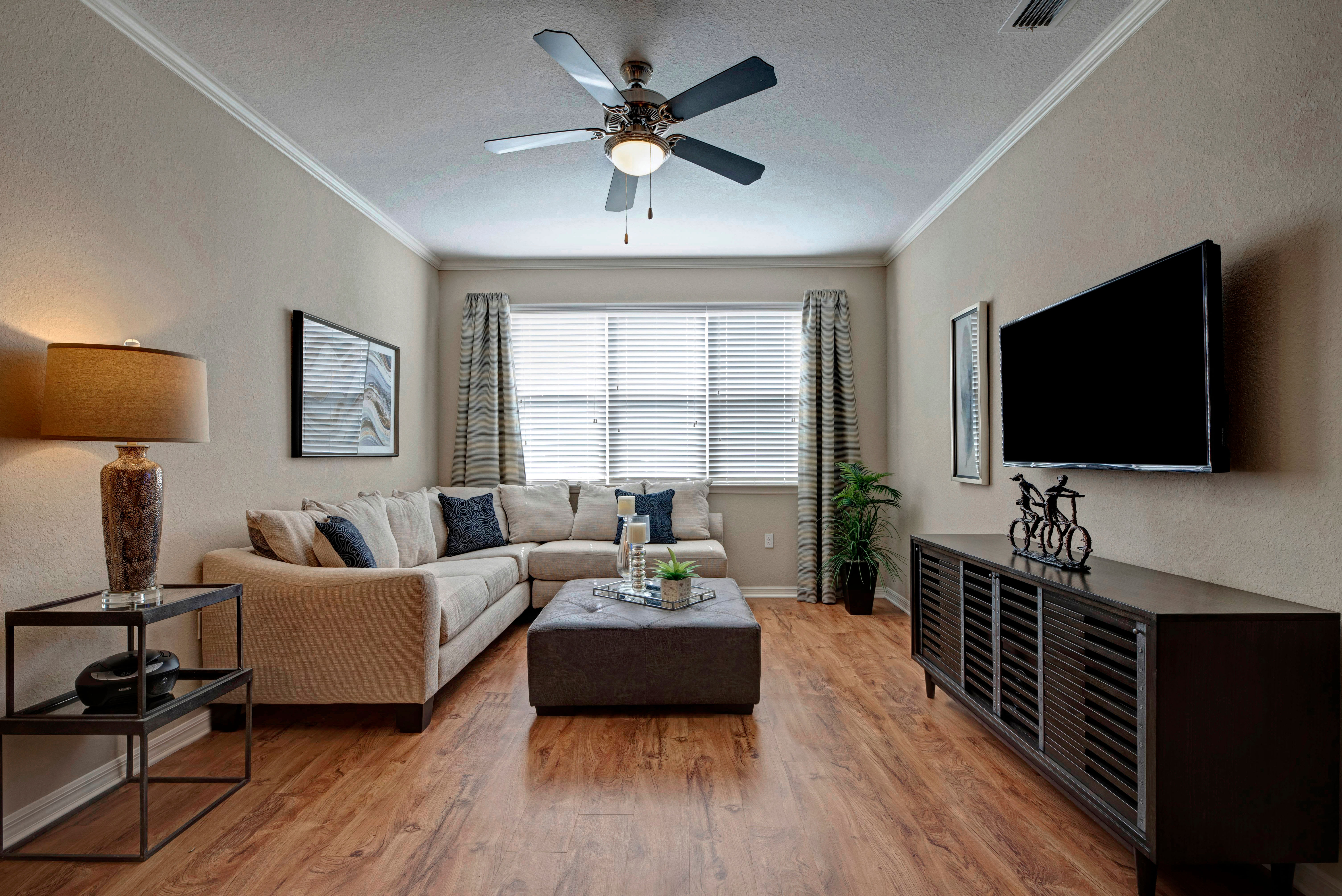 Living room with natural lighting at Integra Lakes in Casselberry, Florida