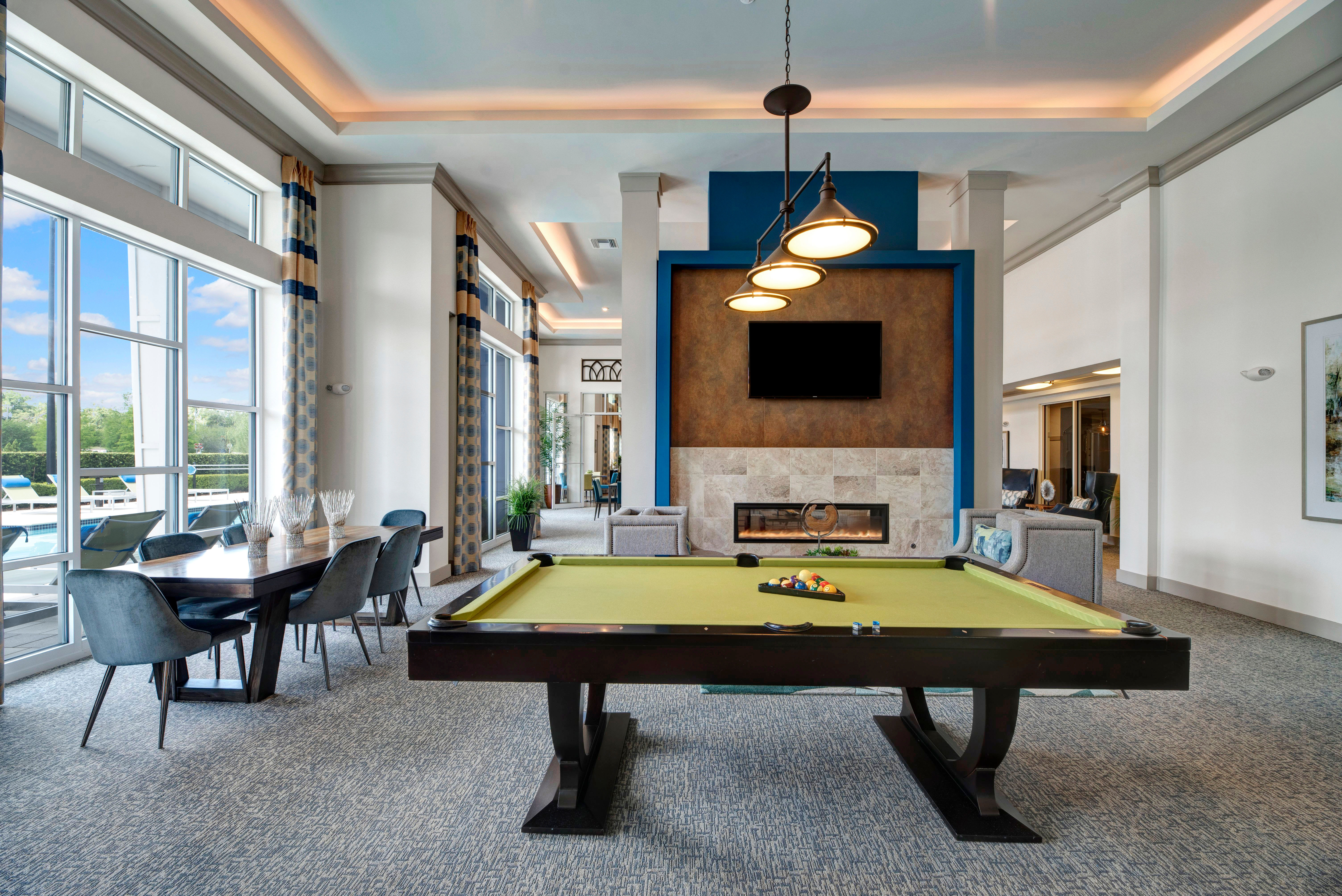 Large room with pool table at Integra Lakes in Casselberry, Florida