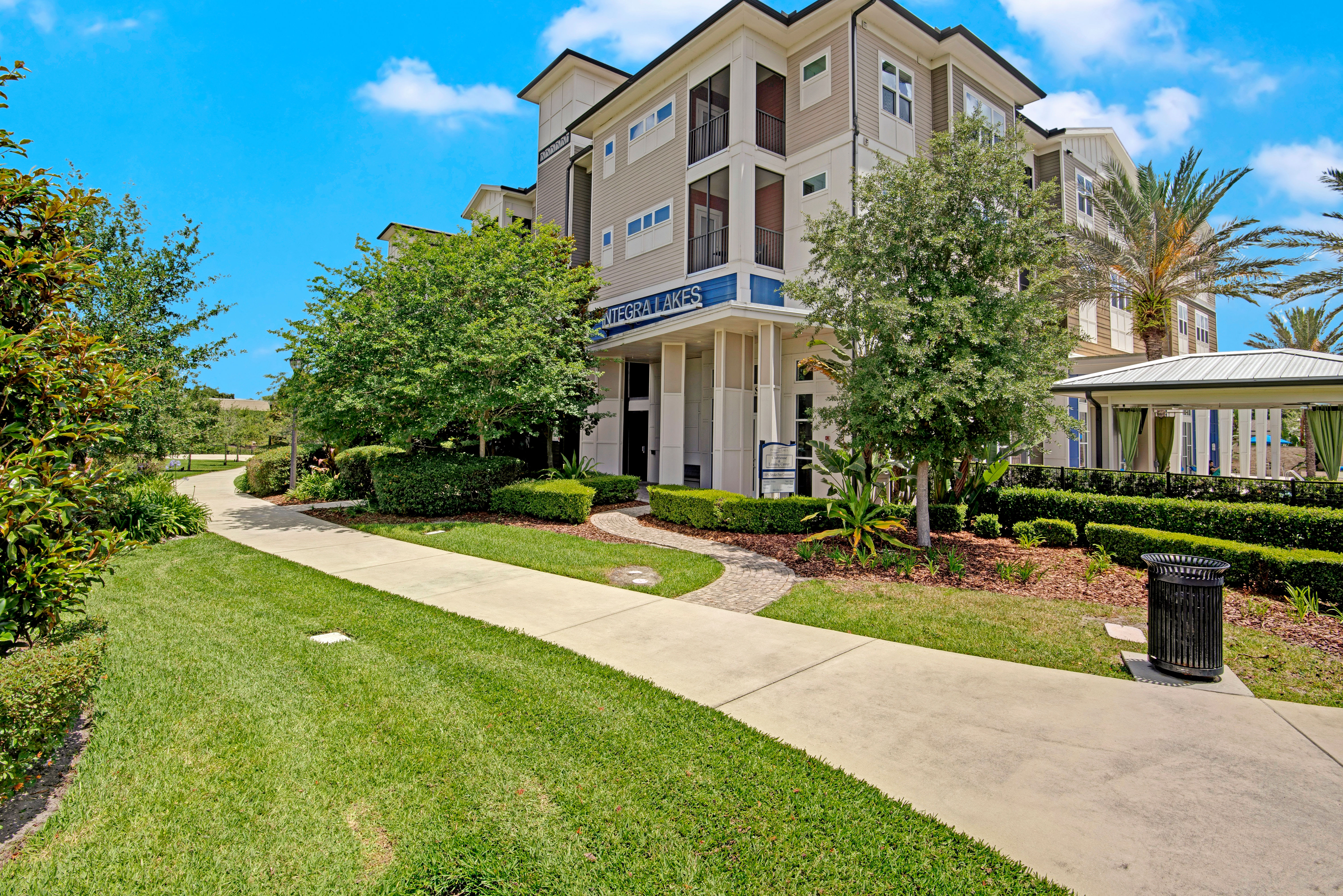 Walking trail next to apartments at Integra Lakes in Casselberry, Florida