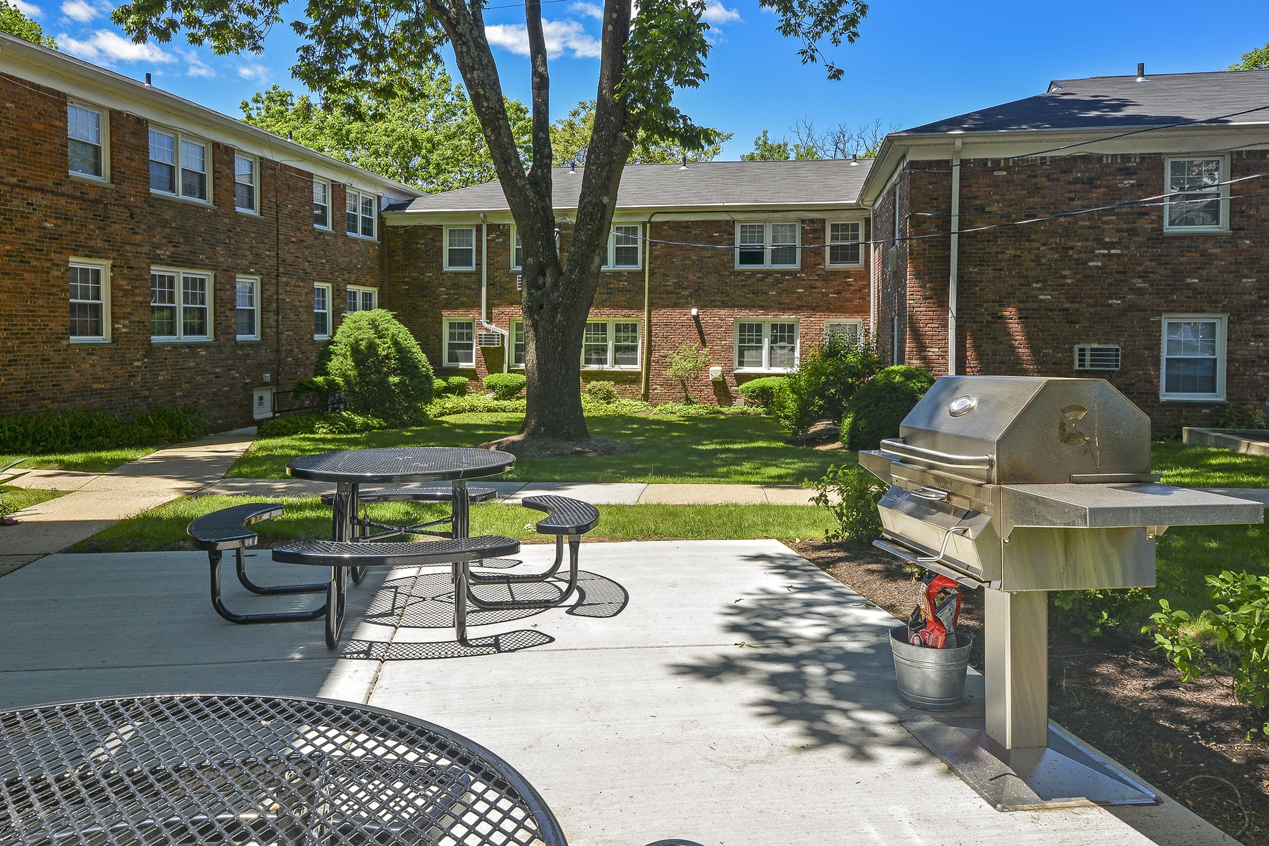 Outdoor patio and grill at Parc at Summit in Summit, New Jersey