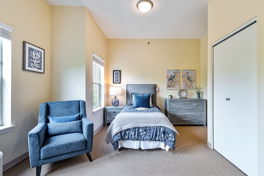 A single bed and dresser at Kenmore Senior Living in Kenmore, Washington