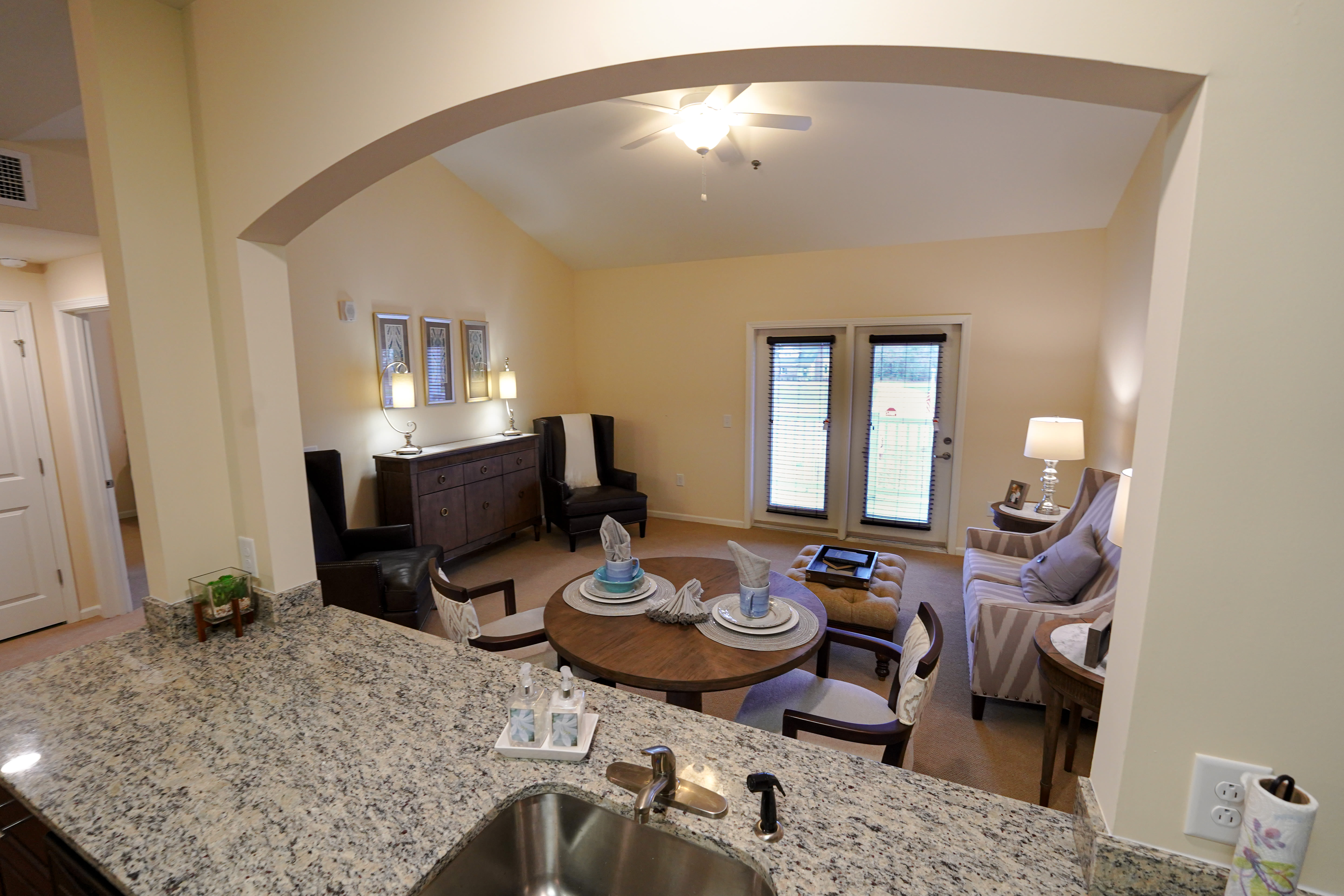 Cozy living room with dining area at The Harmony Collection at Columbia in Columbia, South Carolina
