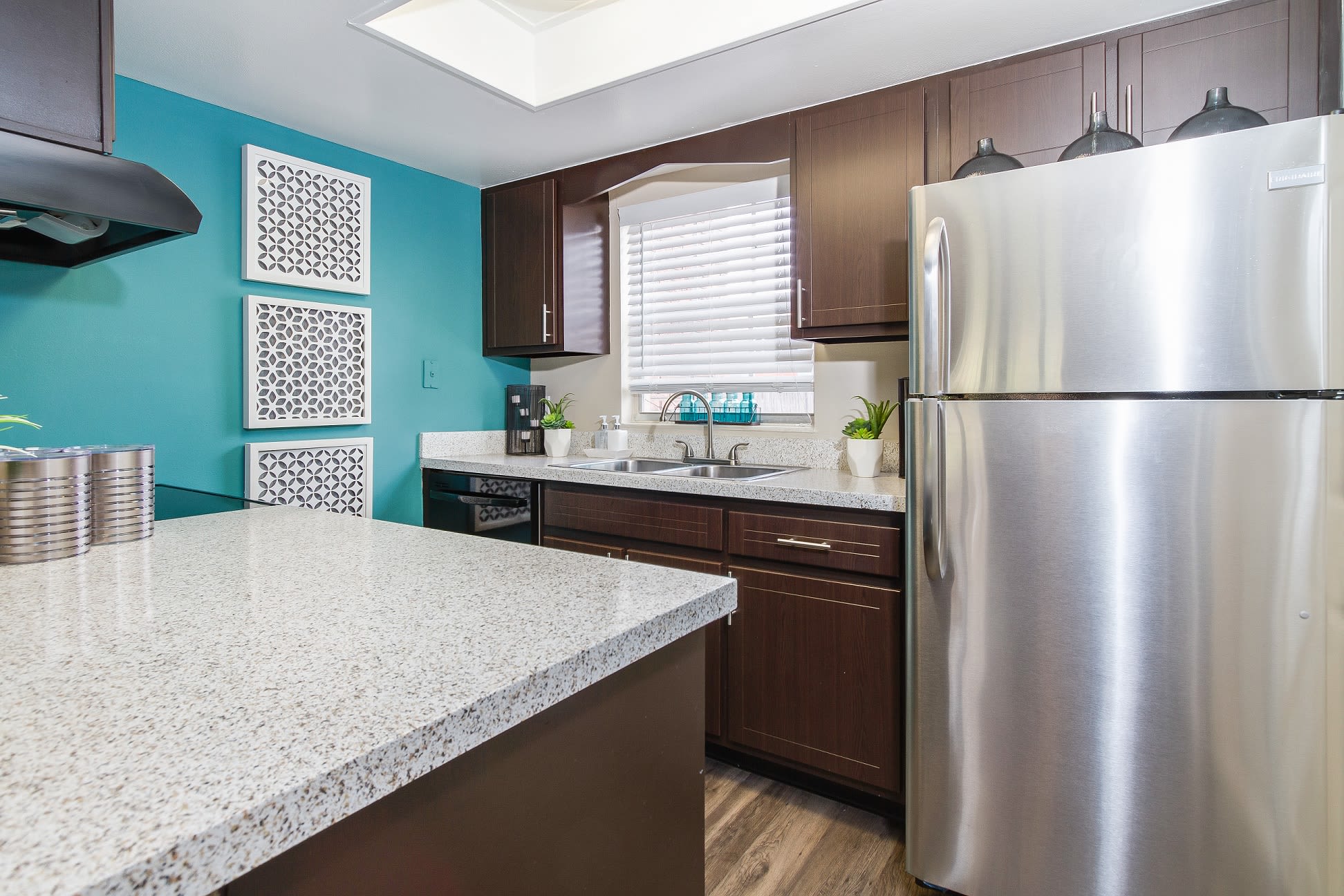 Fully equipped kitchen with stainless steel appliances at Central Place at Winter Park in Winter Park, Florida