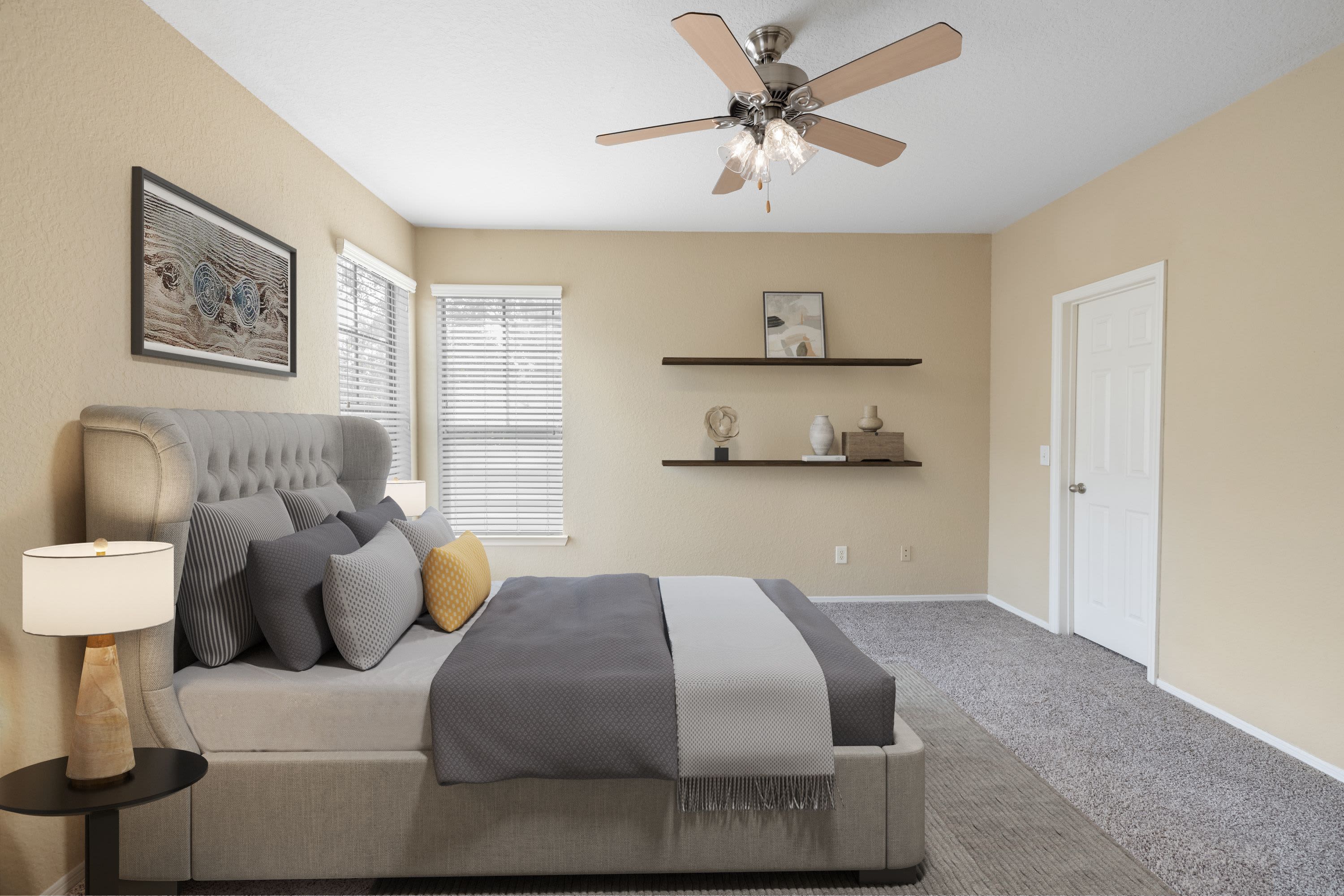 Bedroom with a ceiling fan at Verandahs of Brighton Bay | Apartments & Townhomes in St. Petersburg, Florida