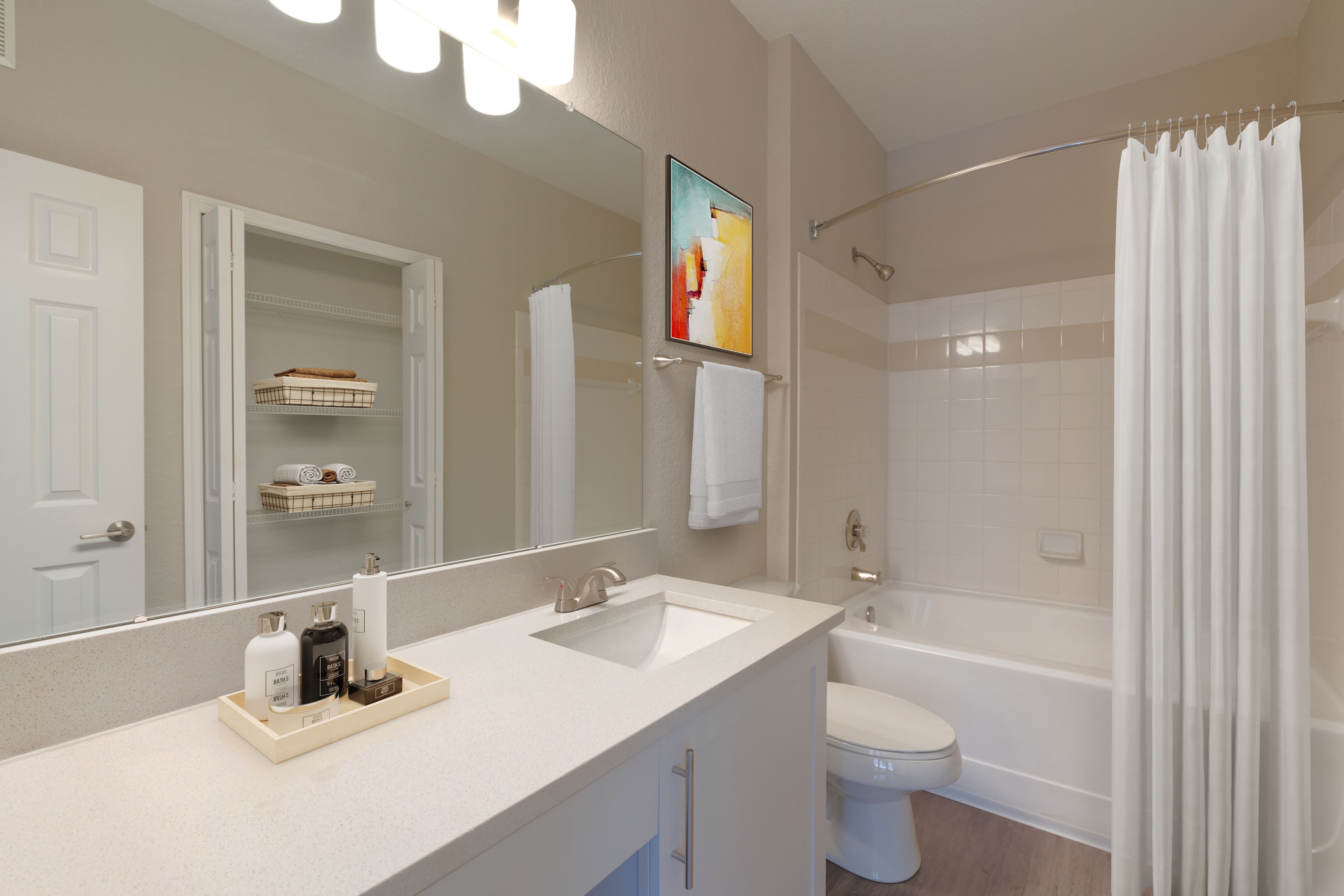 Bathroom with double sinks at Verandahs of Brighton Bay | Apartments & Townhomes in St. Petersburg, Florida