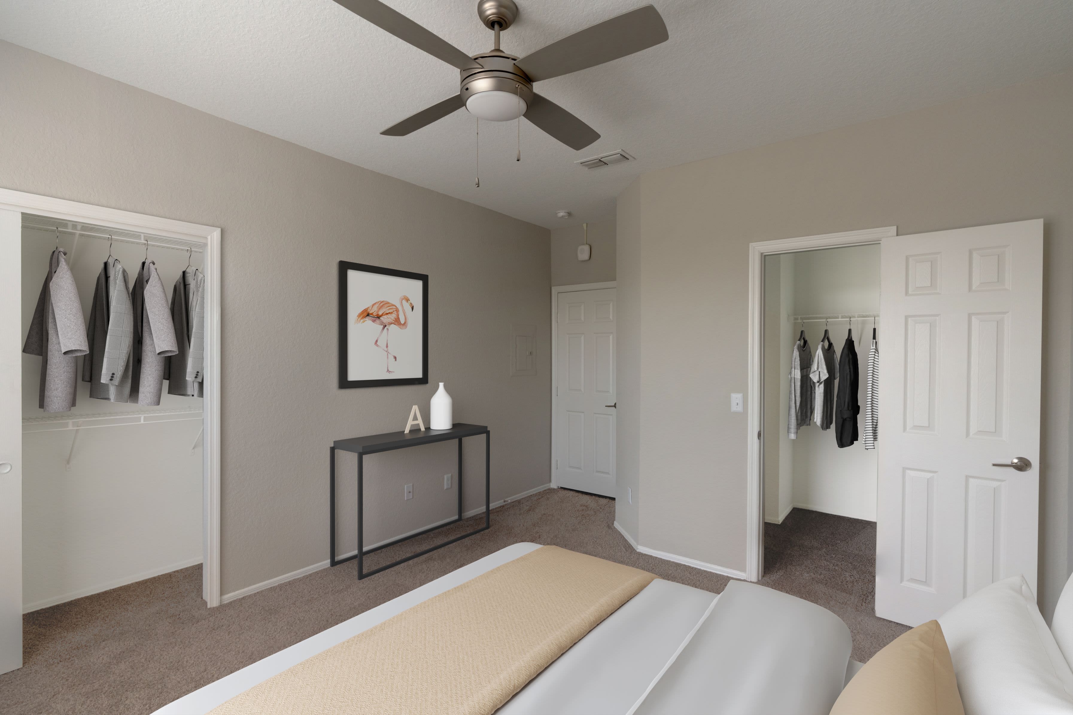 Bedroom with a walk-in closet at Verandahs of Brighton Bay | Apartments & Townhomes in St. Petersburg, Florida