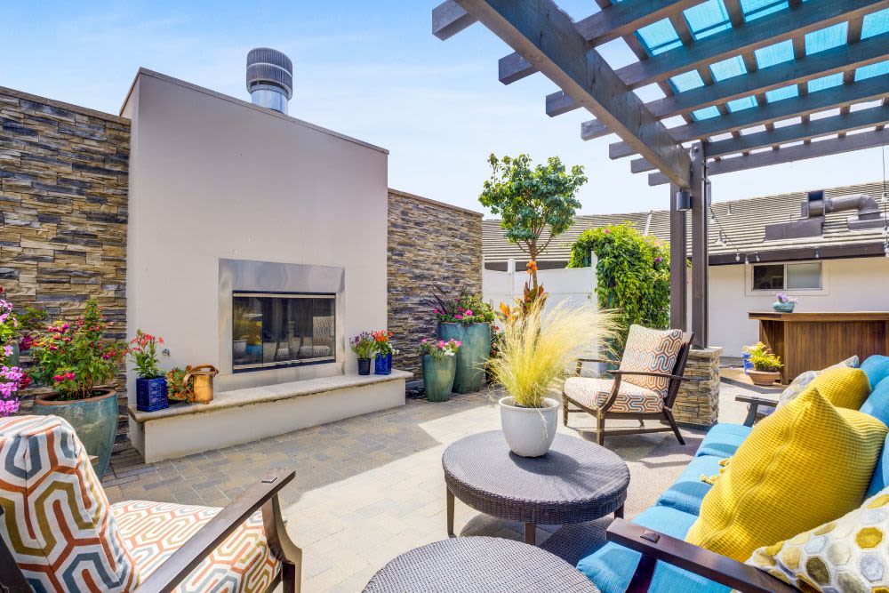 Outdoor courtyard and fireplace at Madonna Gardens in Salinas, California. 