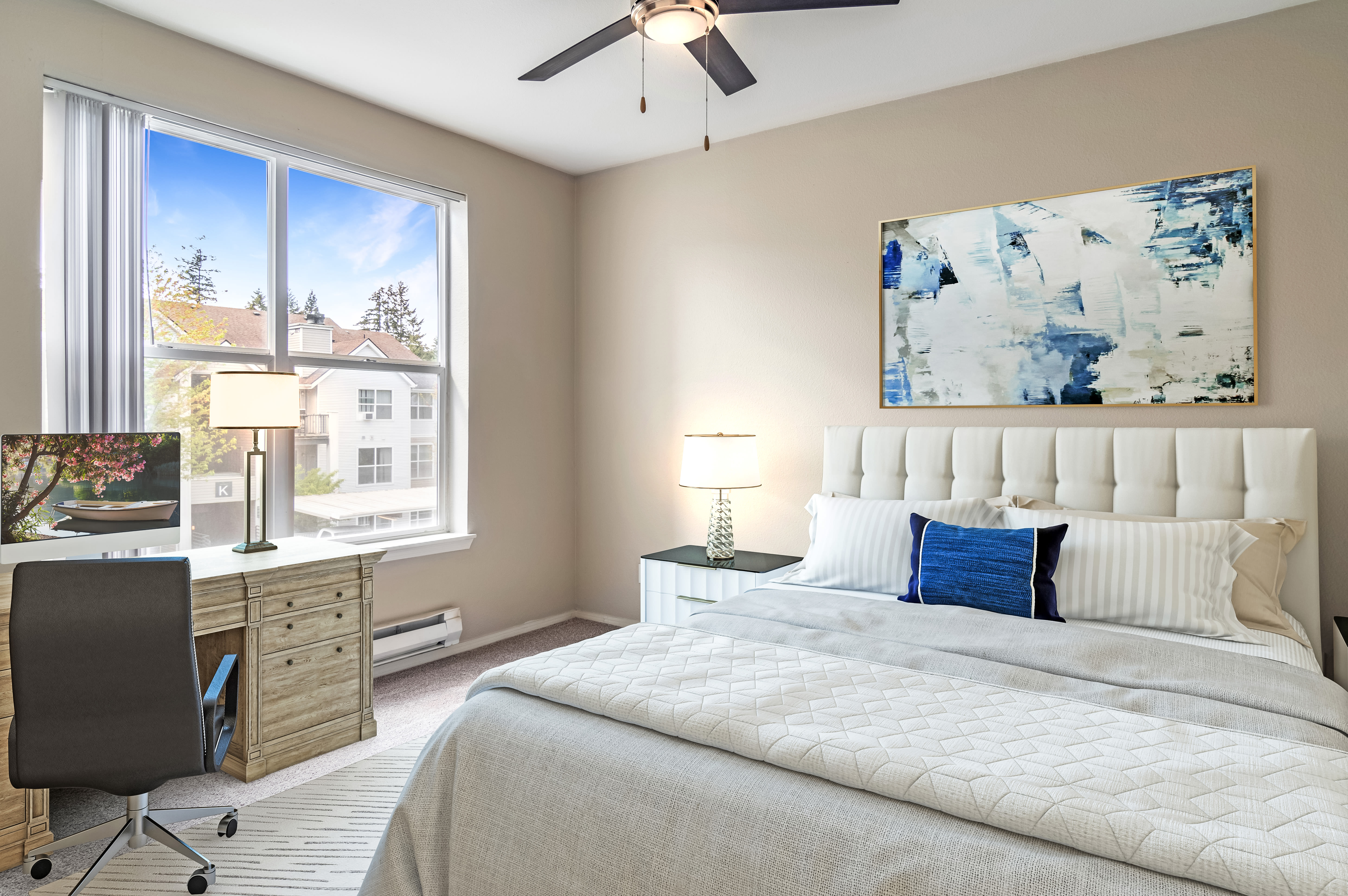 Bedroom with ceiling fan at HighGrove Apartments in Everett, Washington