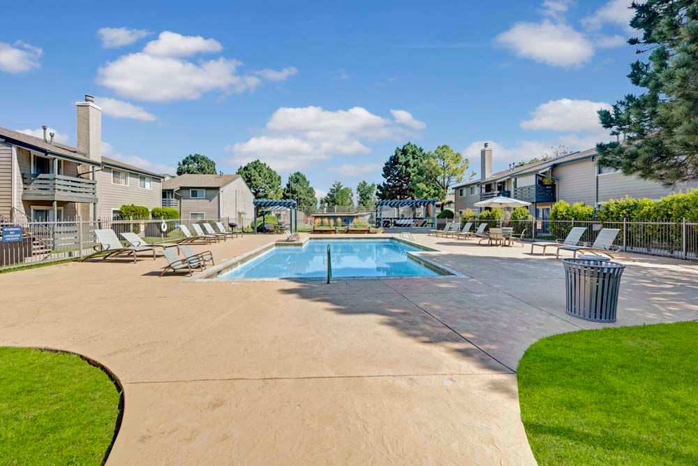 Beautiful Swimming Pool with walkways at Hampden Heights Apartments in Denver, Colorado
