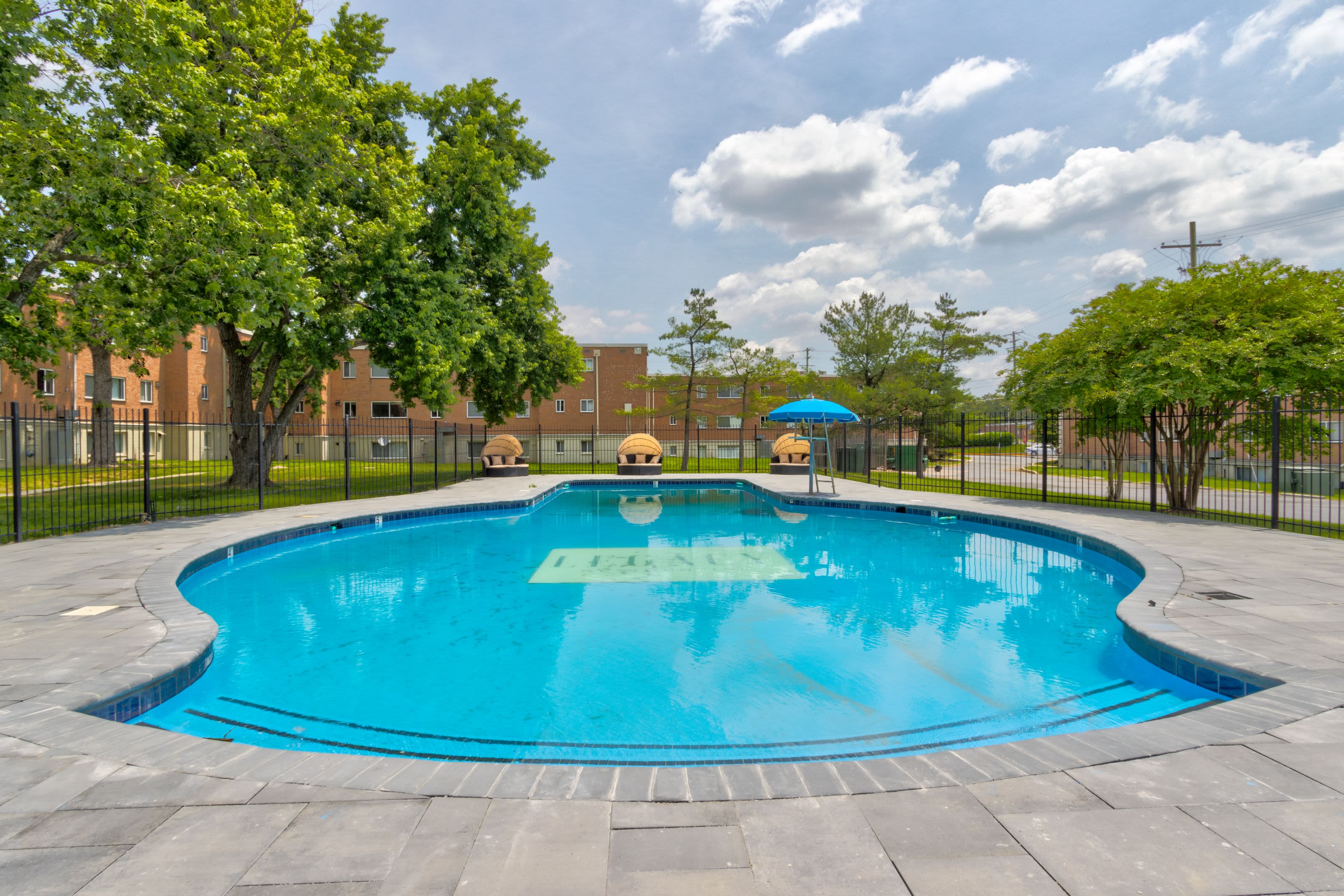 Pool front view at Flats of Forestville Apartment Homes in Forestville, Maryland