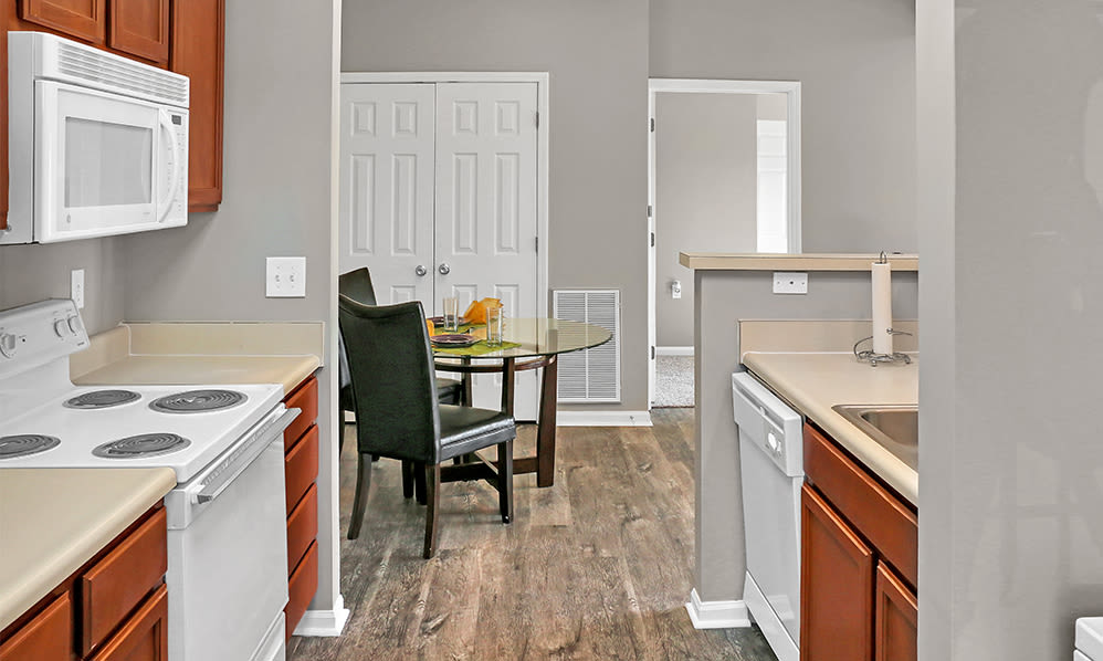 Kitchen and dining area in a home at Avalon at Northbrook Apartments & Townhomes in Fort Wayne, Indiana