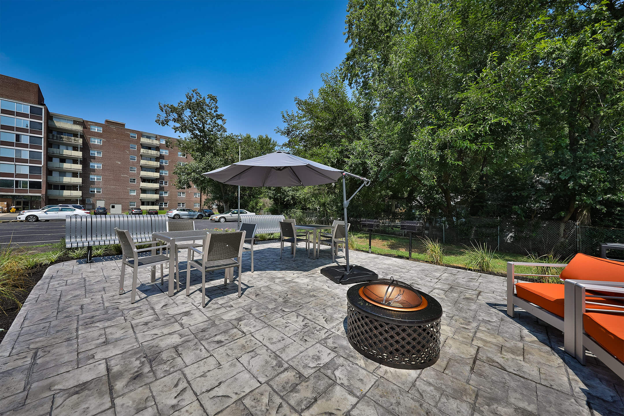 Outdoor seating with a firepit at Parc at Cherry Hill, Cherry Hill, New Jersey