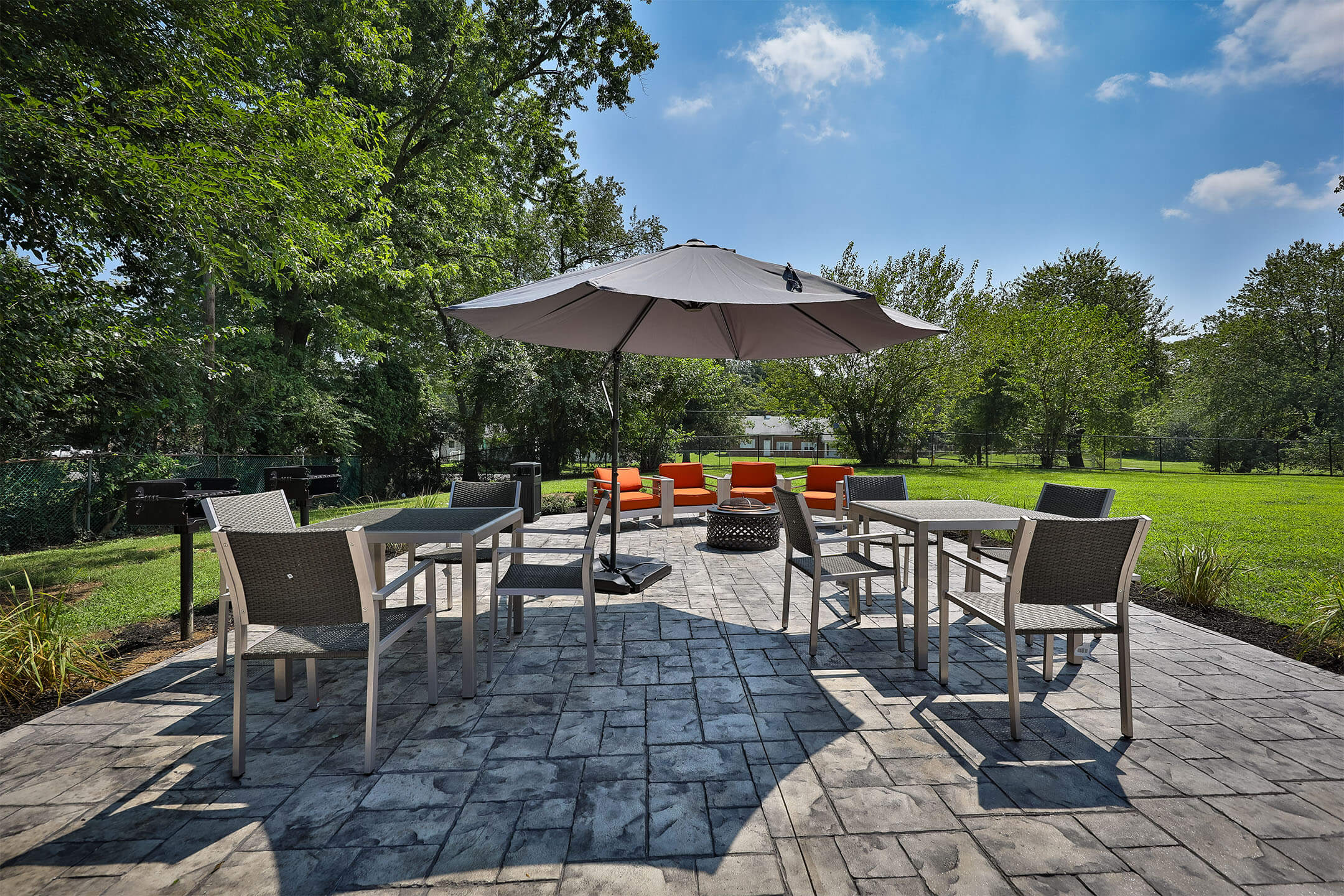 Outdoor seating with umbrella at Parc at Cherry Hill, Cherry Hill, New Jersey