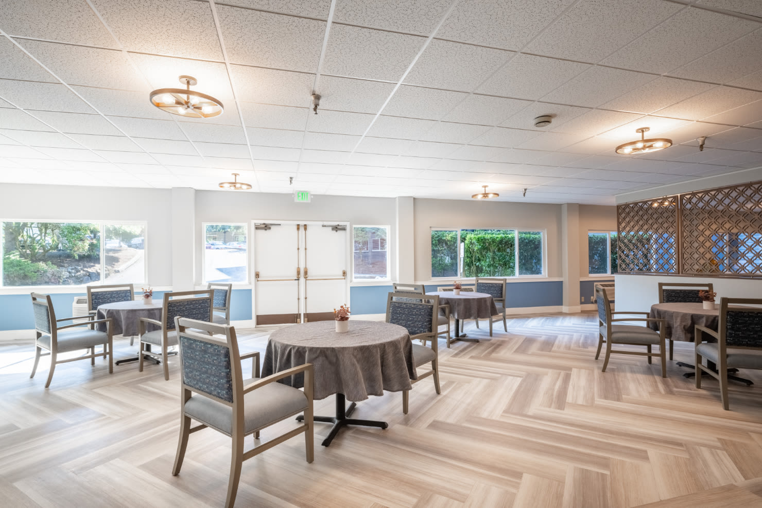 A peaceful community dining room area at The Village Senior Living in Tacoma, Washington
