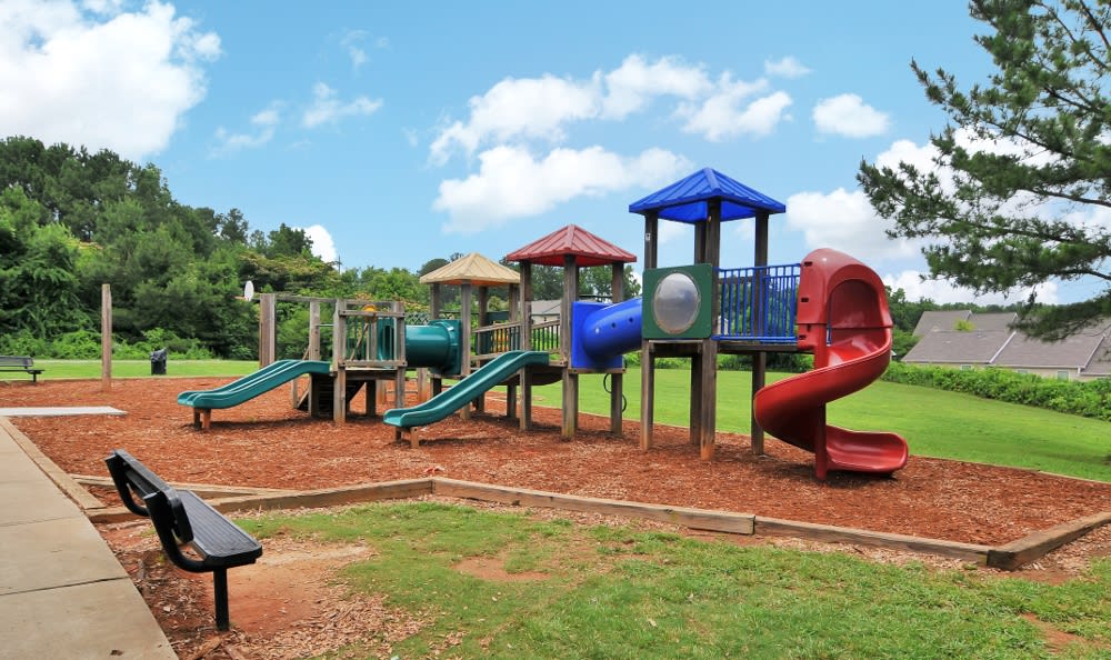 Kid Friendly park with grass surrounding for lots of room to play at Cherokee Summit Apartments in Acworth, Georgia