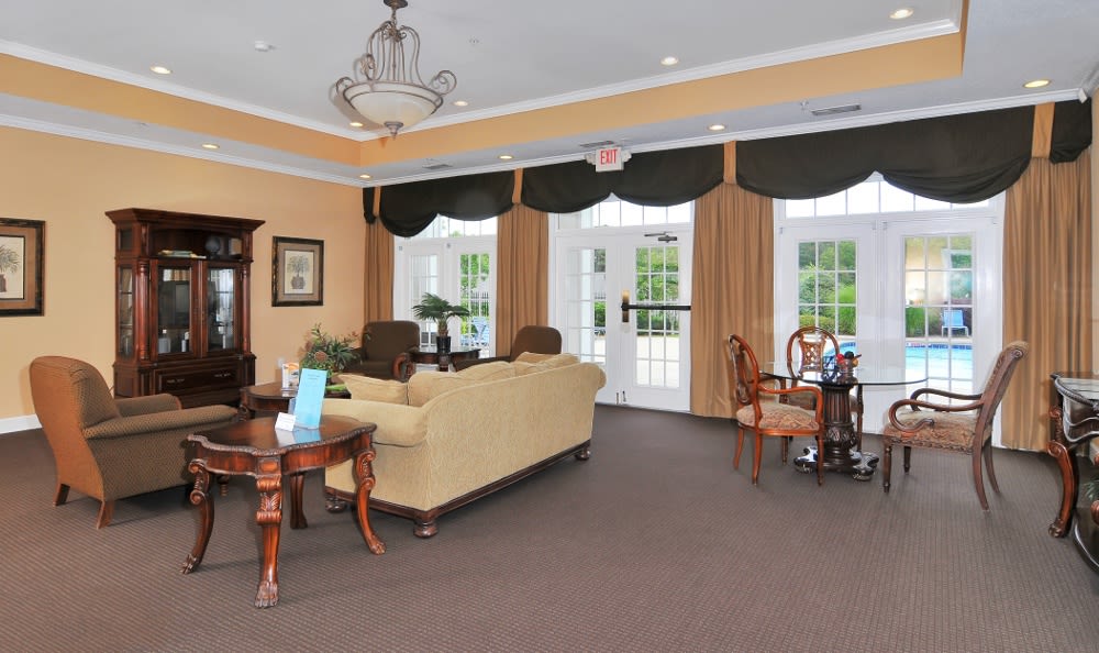 Spacious clubhouse lounge area with lots of light at Cherokee Summit Apartments in Acworth, Georgia