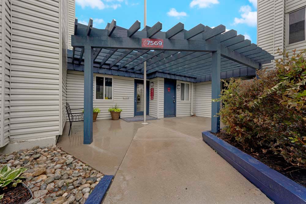 Leasing office entrance at Arvada Green Apartment Homes in Arvada, Colorado
