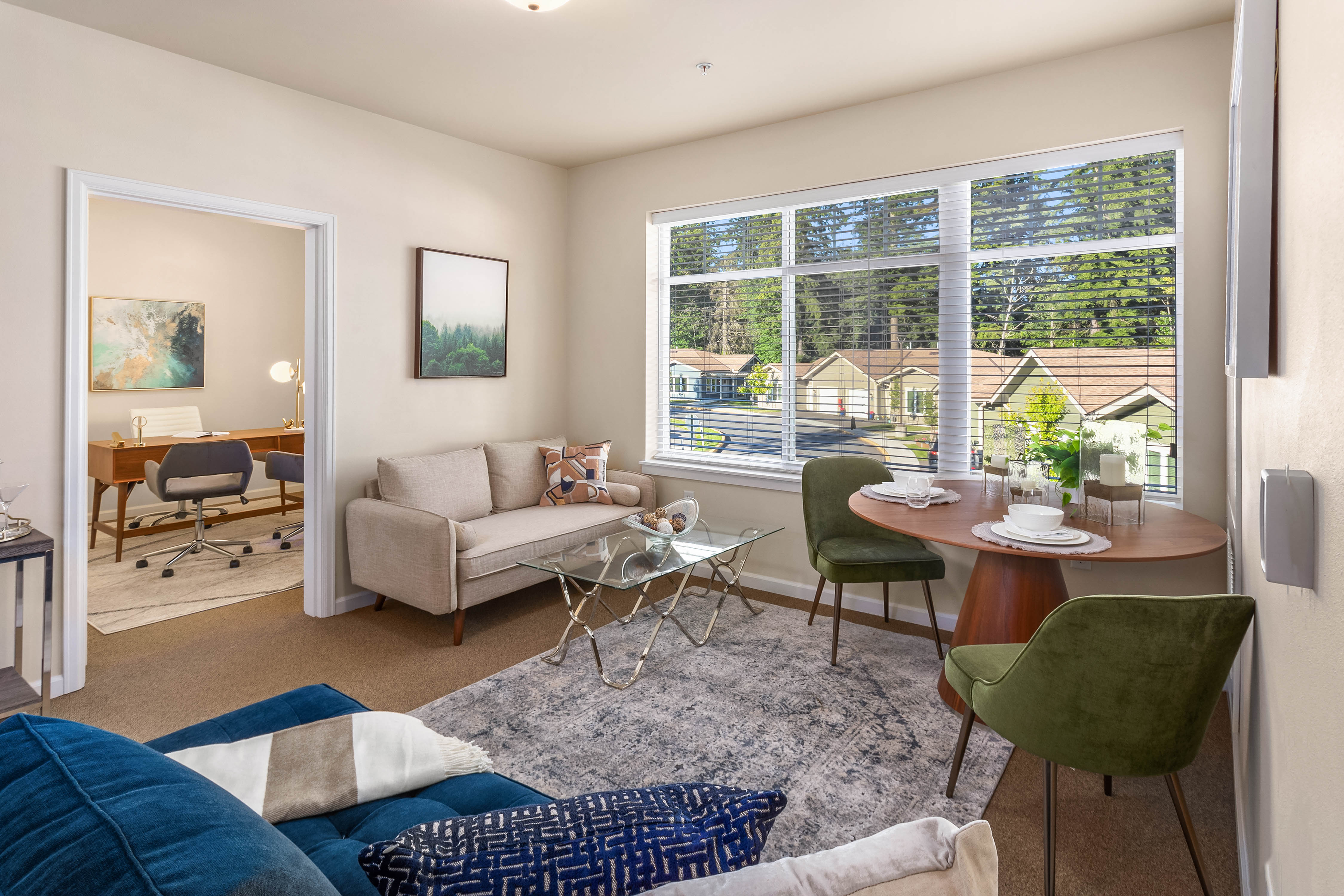Living room and office at Quail Park of Lynnwood in Lynnwood, Washington