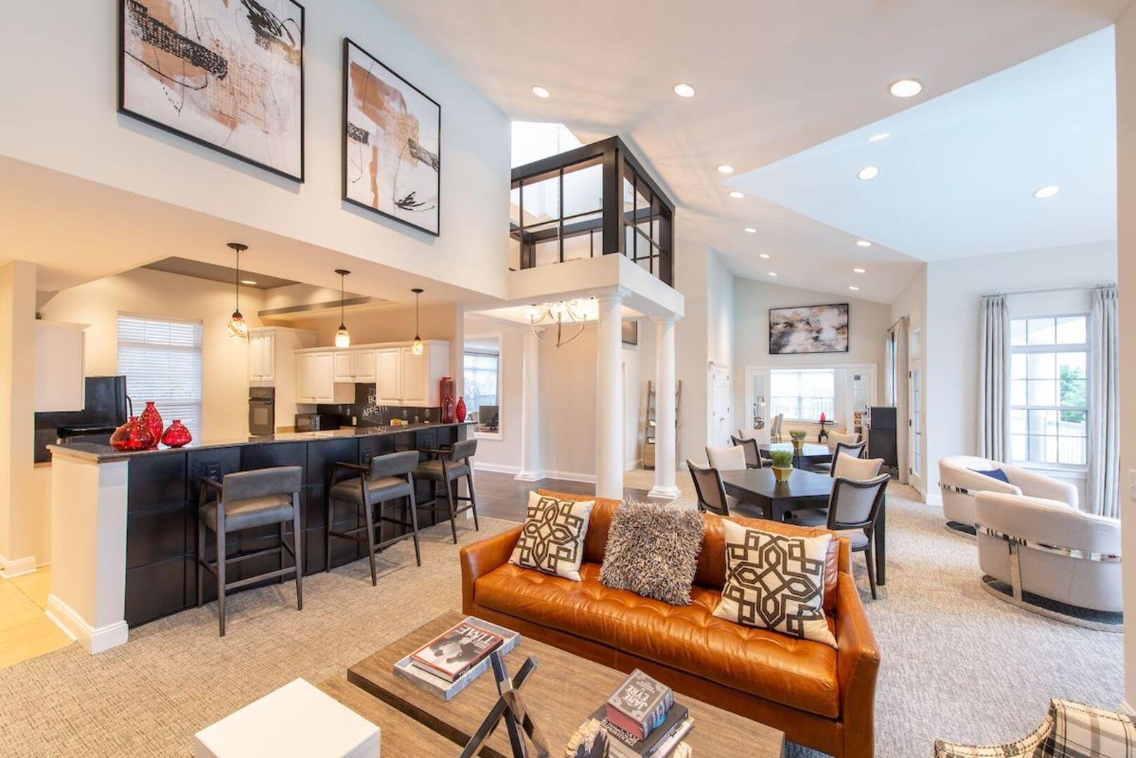 Community clubhouse featuring a resident lounge area and a fully equipped community kitchen at The Elms at Germantown in Germantown, Maryland
