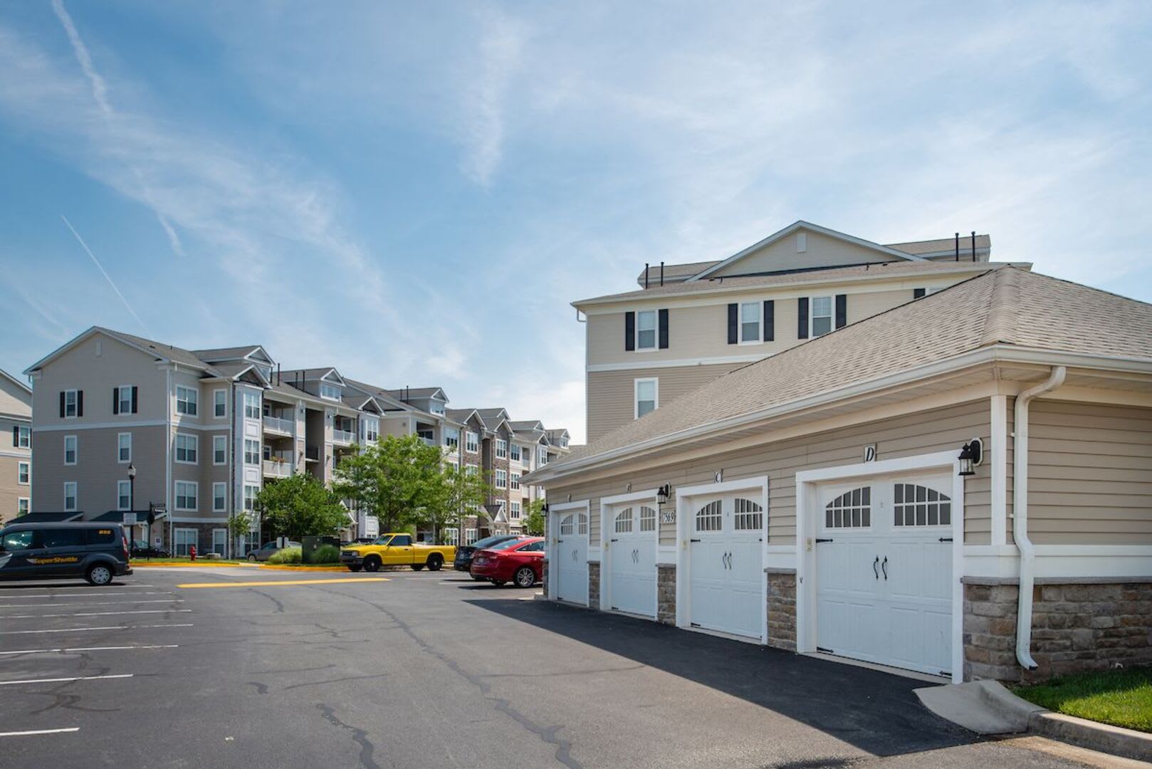 Car parking slots along with garages at The Elms at Stoney Run Village in Hanover, Maryland