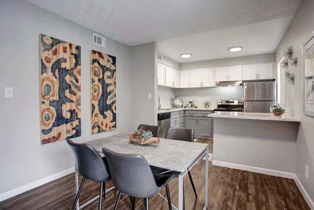 Dining area and kitchen at 505 West Apartment Homes in Tempe, Arizona