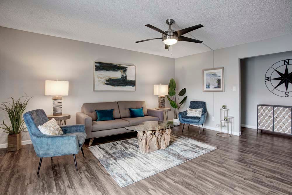 Spacious living room with wood flooring at 505 West Apartment Homes in Tempe, Arizona