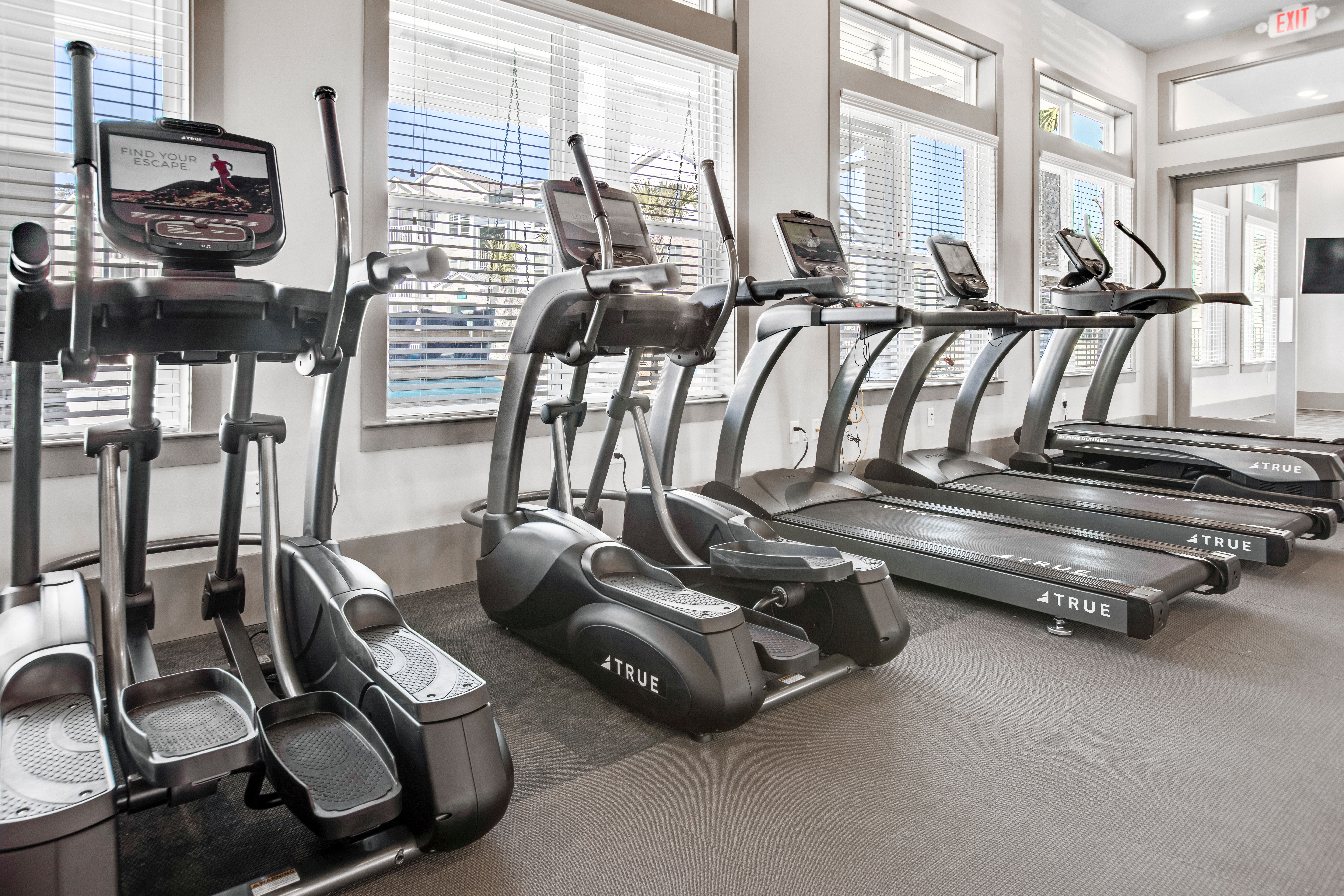 Full sized state of the art fitness center at South City Apartments in Summerville, South Carolina