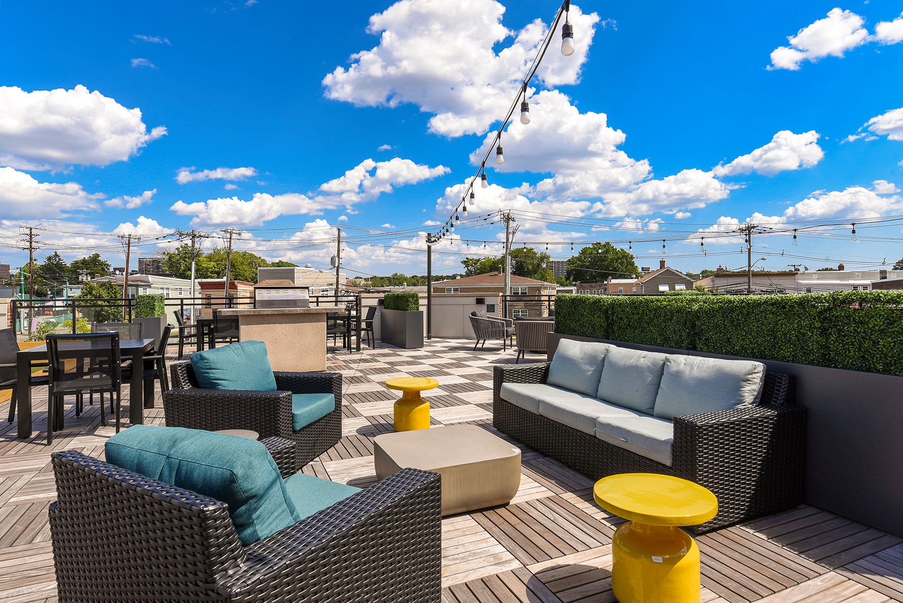 Rooftop patio with lounge chairs atSilverLake in Belleville, New Jersey