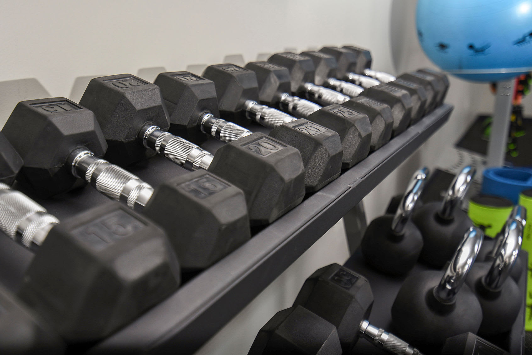 Dumbbells on a rack in the on-site fitness center at SilverLake in Belleville, New Jersey