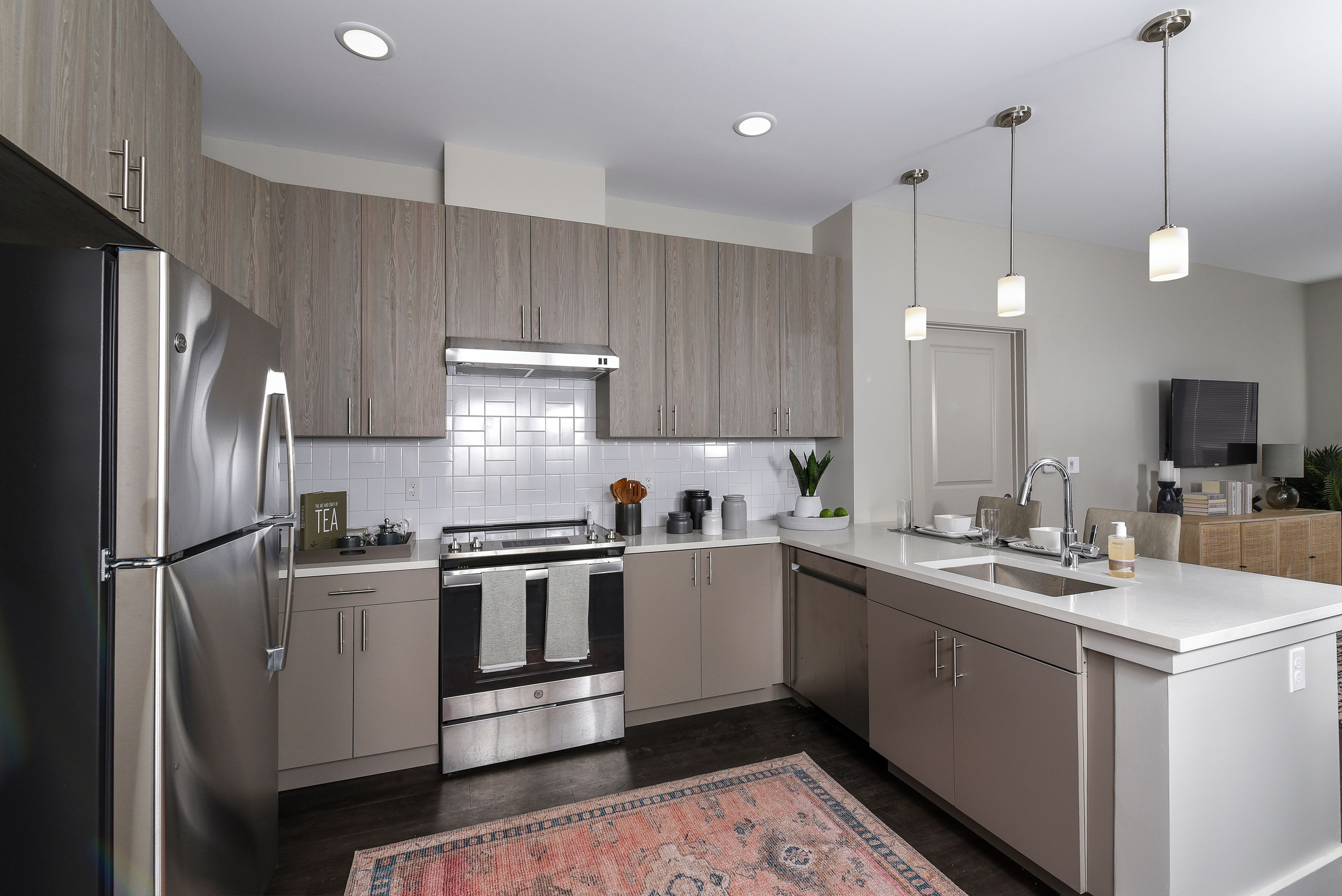 Model kitchen with wood cabinets at SilverLake, Belleville, New Jersey