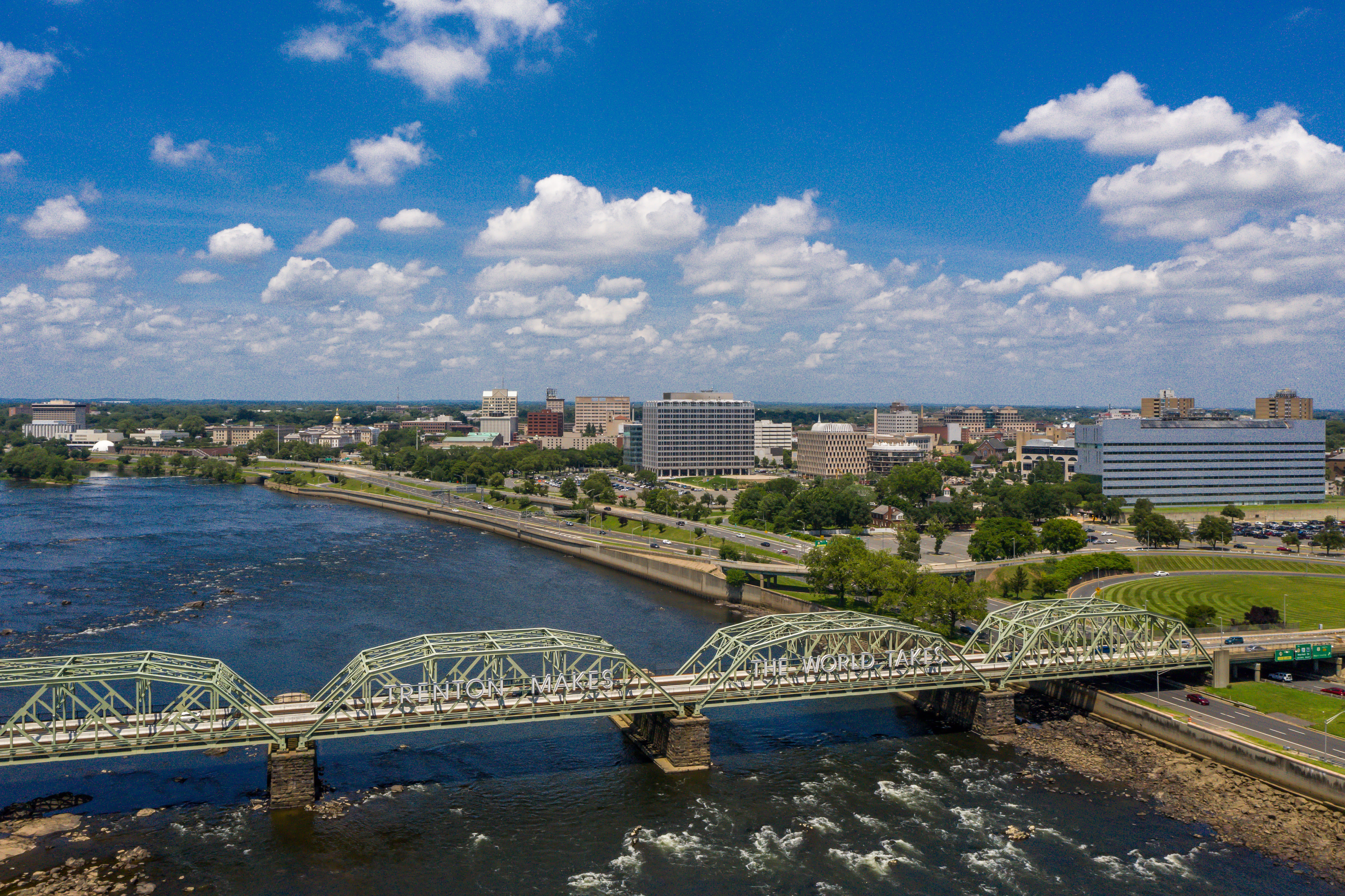 Arial view of bridges over water and the town near The Nolan in Morrisville, Pennsylvania