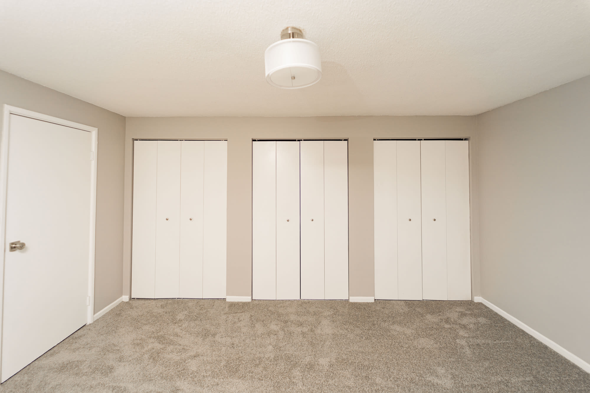 Bedroom with plenty of closet storage at Bayshore Apartments in East Haven, Connecticut