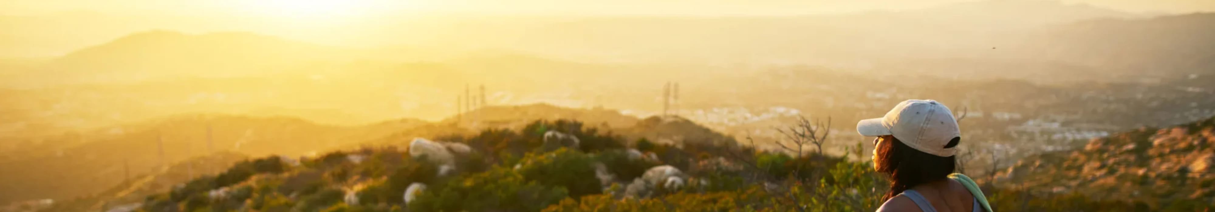 A woman enjoying the sunset near Butterfield Ranch Self Storage in Temecula, California