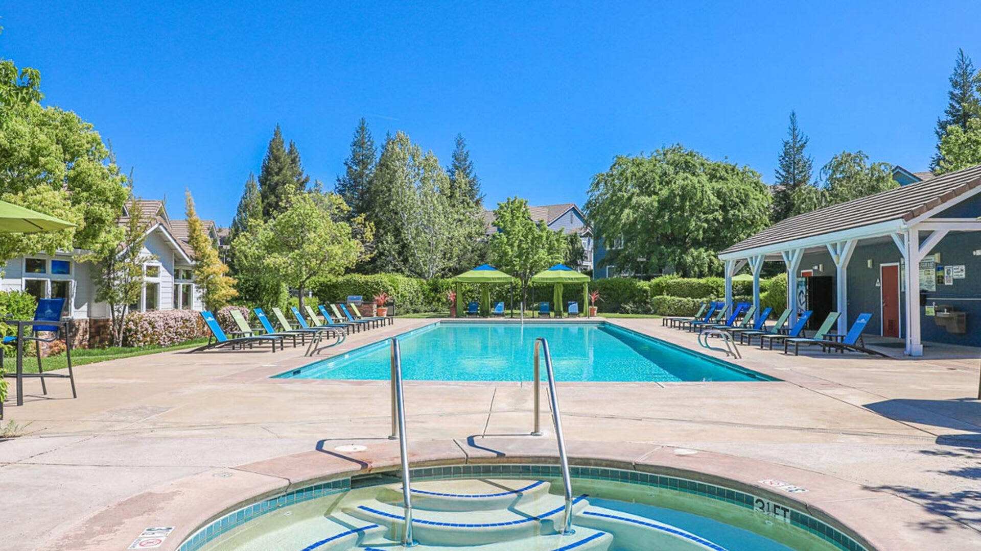Hot tub and swimming pool at Rocklin Ranch Apartments in Rocklin, California